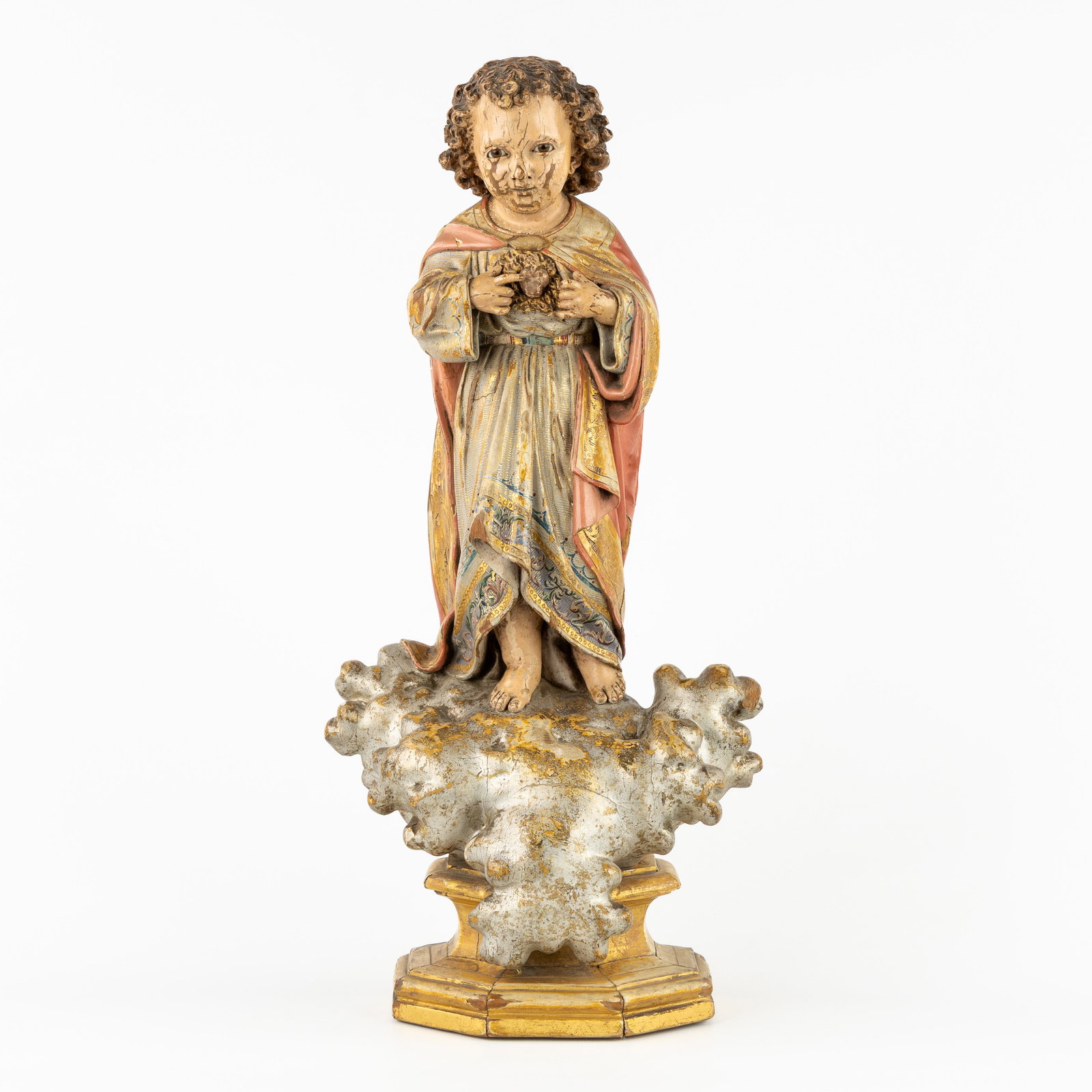French school, a finely sculptured and patinated wooden statue of the Child Jesus with the Sacred: French school, a finely sculptured and patinated wooden statue of the Child Jesus with the Sacred Heart, Gothic Revival, 19th century. Sculptured, gilded, and patinated wood. Finished with glass eyes.