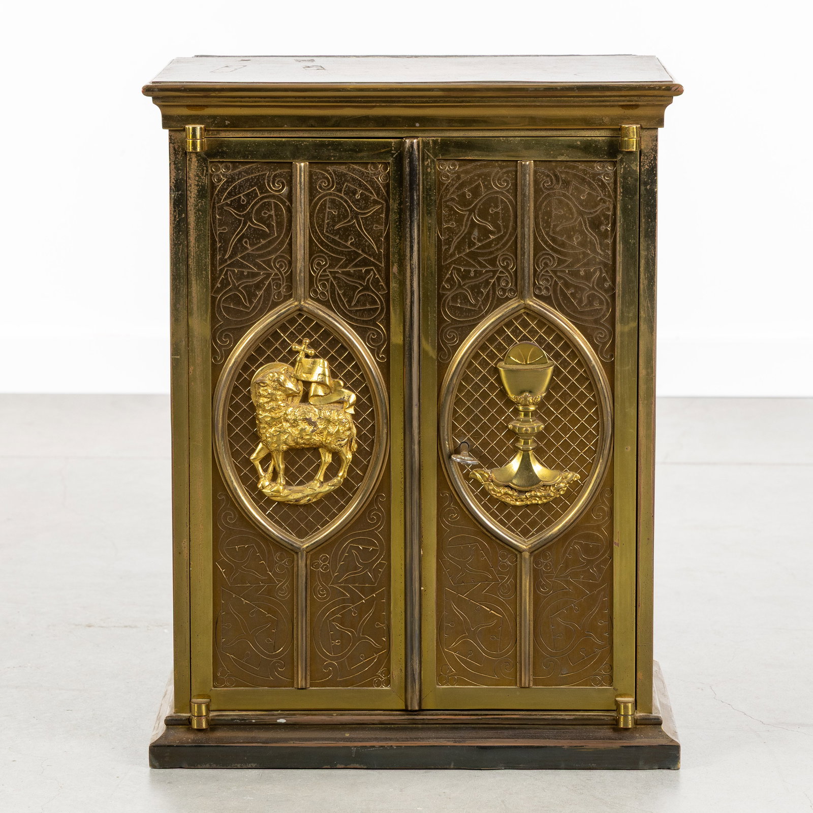 A tabernacle, polished bronze with depictions of “The Holy Grail?? and “The Lamb of God??. (1 of 6)