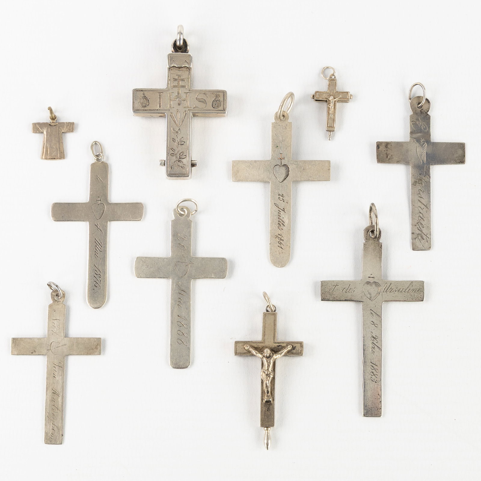 10 Silver and silver-plated crucifix pendants and reliquary pendants, Ex Voto, 19th C. (1 of 2)