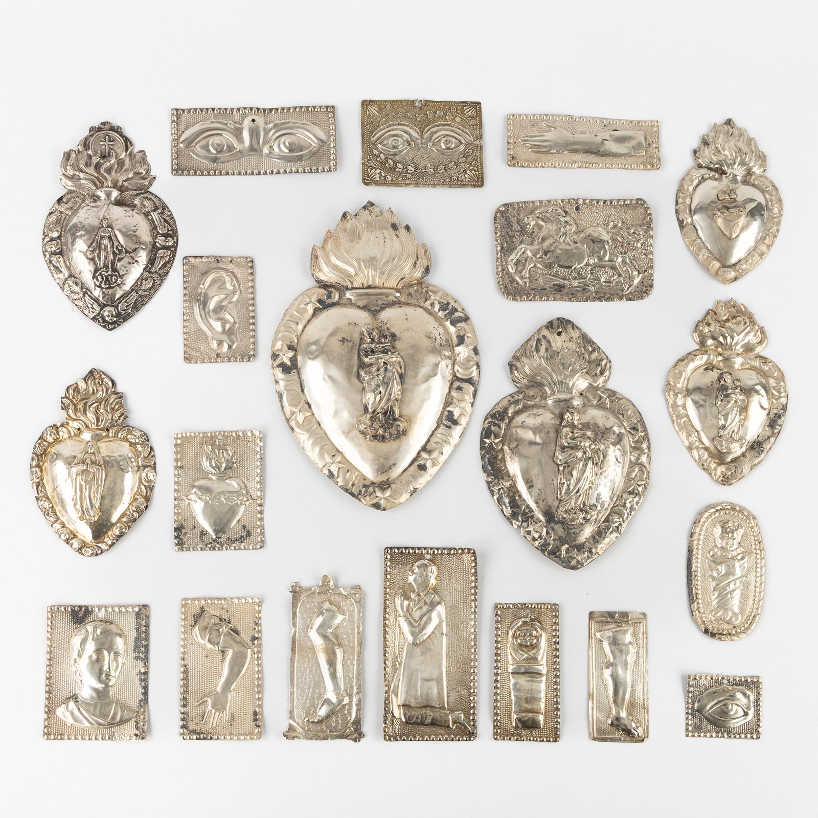 Twenty Ex Voto, with Sacred Hearts and others. Silver, 116g. (1 of 7)