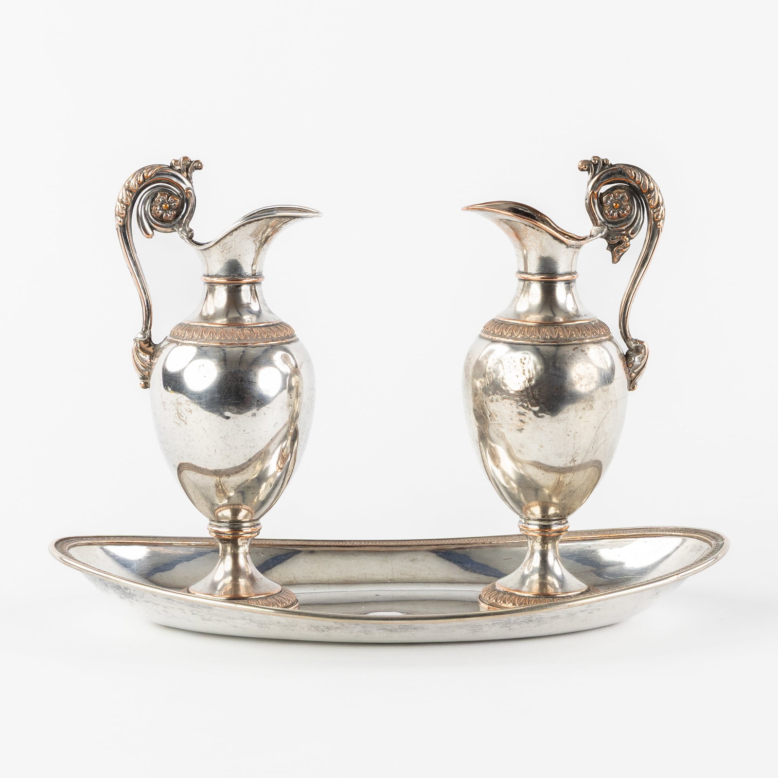 A Pair of Neoclassical wine and water altar cruets, silver-plated copper. (1 of 11)