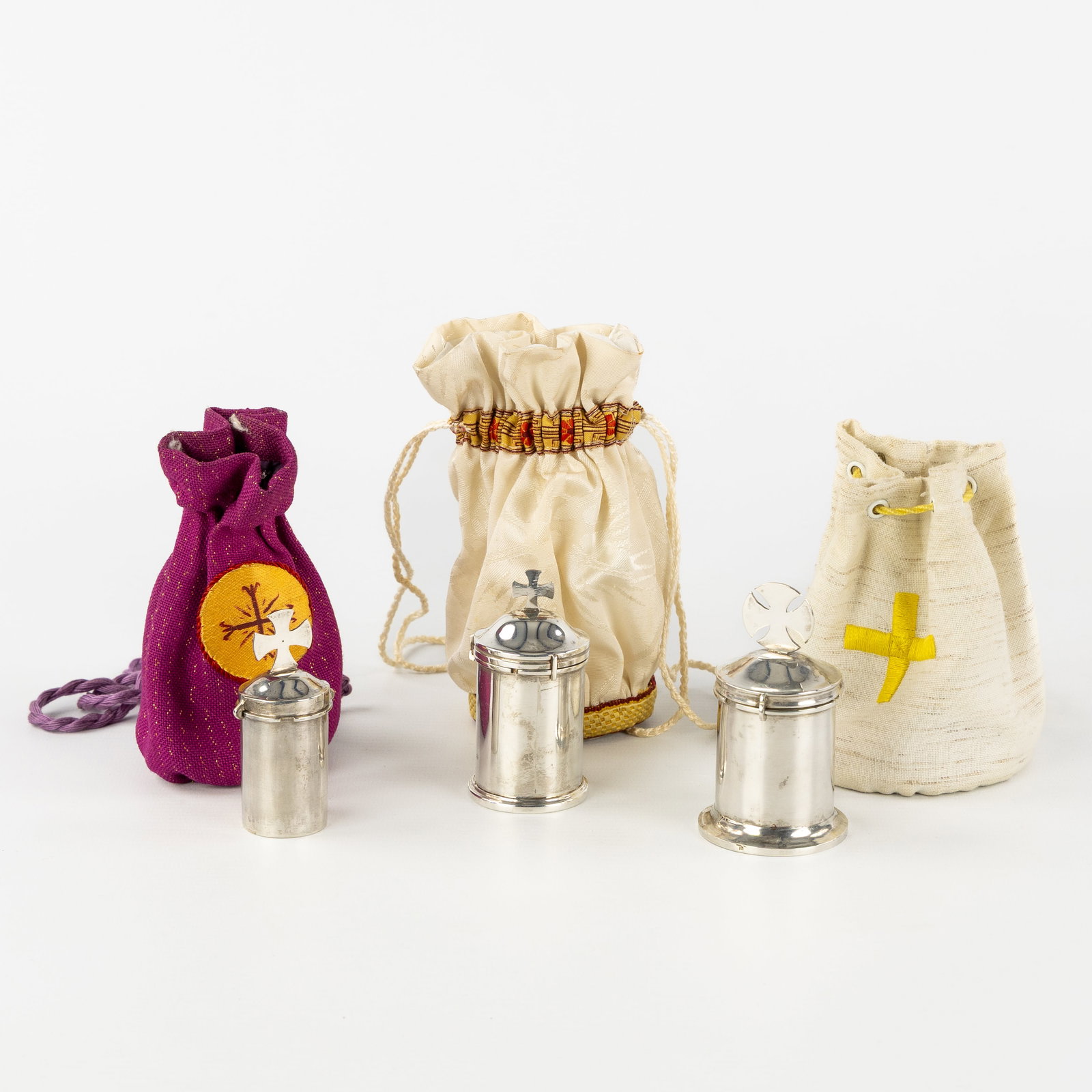 Three silver Chrismatoria or oil boxes, in storage bags. Silver. (1 of 9)