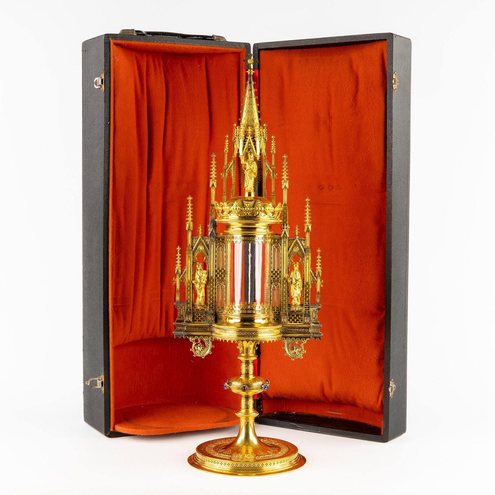 Bourdon (Attr.) Ghent, a tower monstrance, gilded brass with cabochons, in a chest. Gothic Revival.: Bourdon (Attr.) Ghent, a tower monstrance, gilded brass with cabochons, in a chest. Gothic Revival. Gilded brass.Finished at the top with a sculpture of the Risen Christ.Flanked by the Virgin Mary w