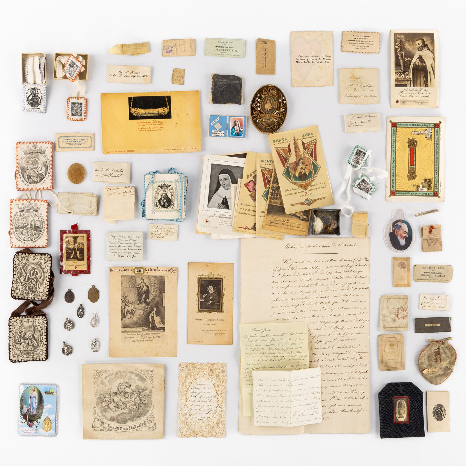 A Large collection of relics, reliquaries, and scapulars, 19th and 20th C. (1 of 5)