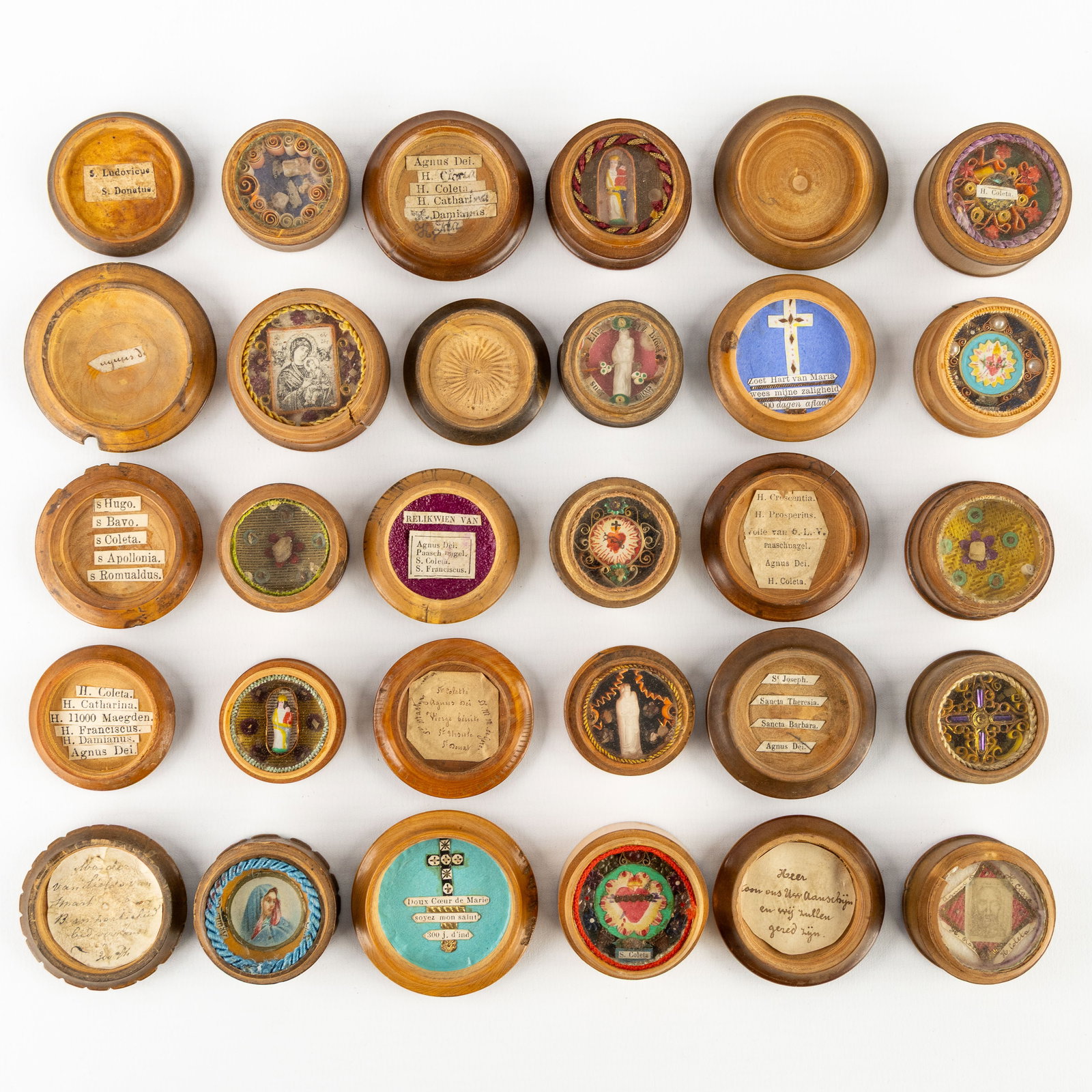 15 Wooden Travel Reliquaries with Relics for Agnus Dei, Saints, and Martyrs.: 15 Wooden Travel Reliquaries with Relics for Agnus Dei, Saints, and Martyrs. 1. Saint Crescentia Höss (S. Crescentia) Saint Prosperina (S. Porsperins) From the Veil of Our Lady (Toile van O.L.V.) Eas