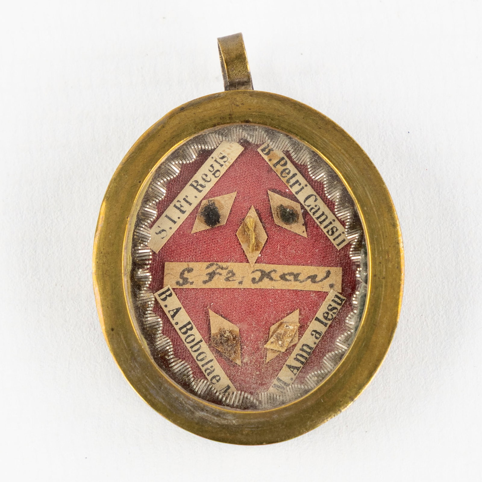 A Sealed theca with relics for Francis Xavier, John Francis Regis, Peter Canisius and others. (1 of 2)