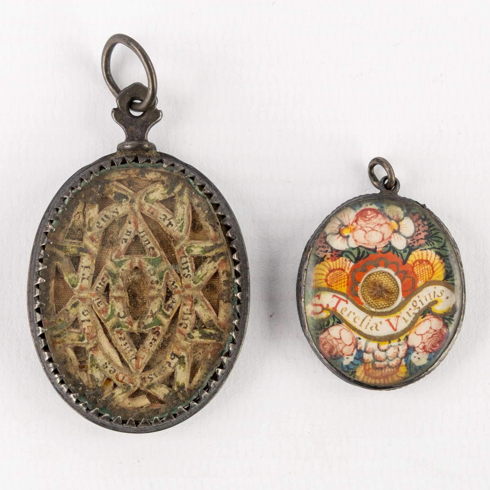 An 18th-century multi-theca and a theca with a relic and miniature painting of Saint Teresa of (1 of 2)