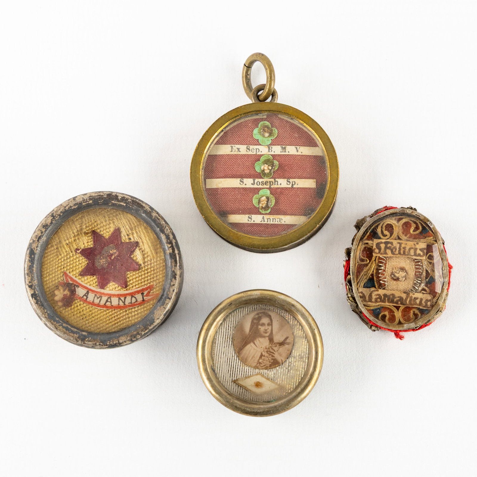 Four sealed multi-theca with relics of Saints and Martyrs, The Virgin Mary and Joseph. (1 of 2)