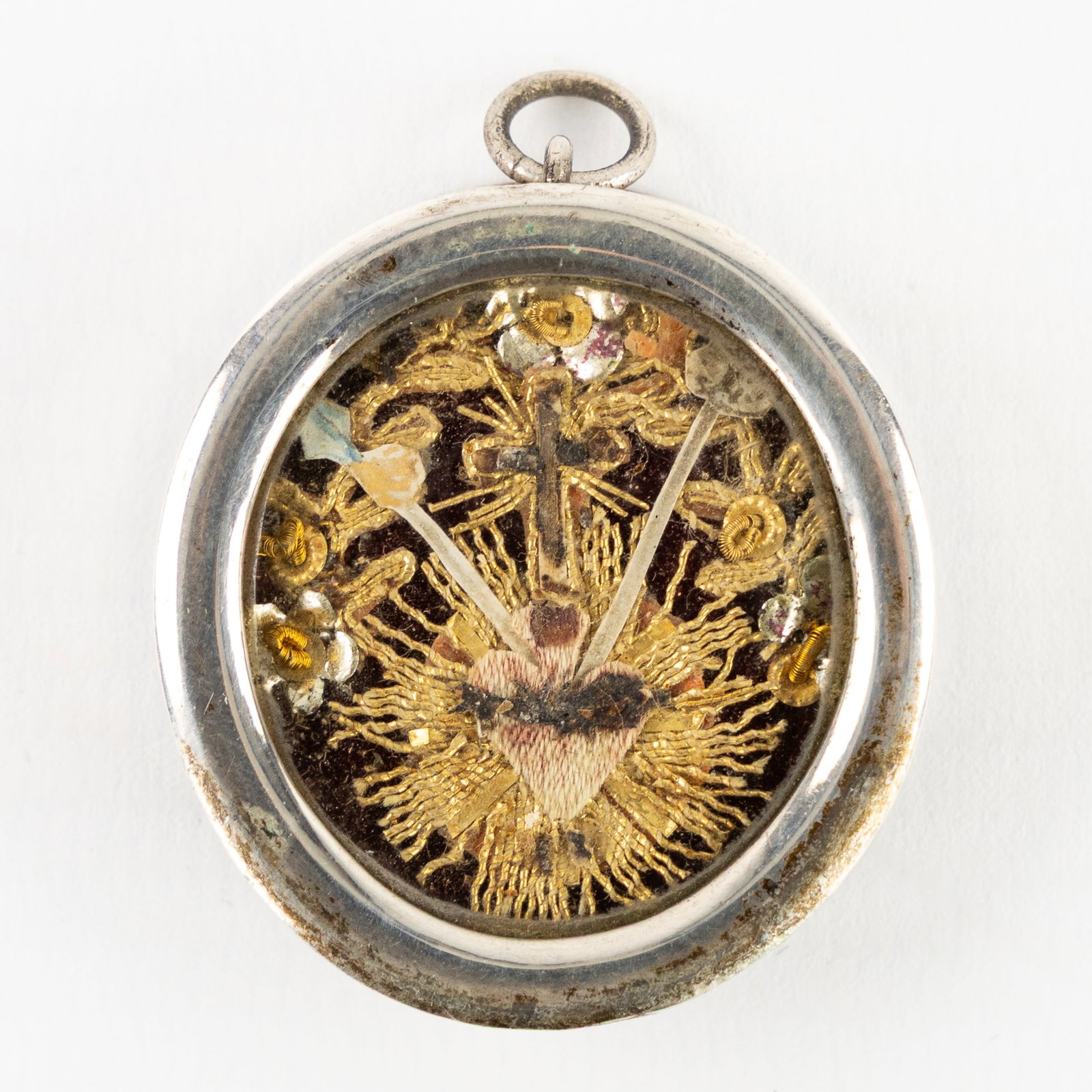 A Silver sealed theca with relics of the True Cross and probably Crown of Thorns, Sponge, and Lance. (1 of 2)