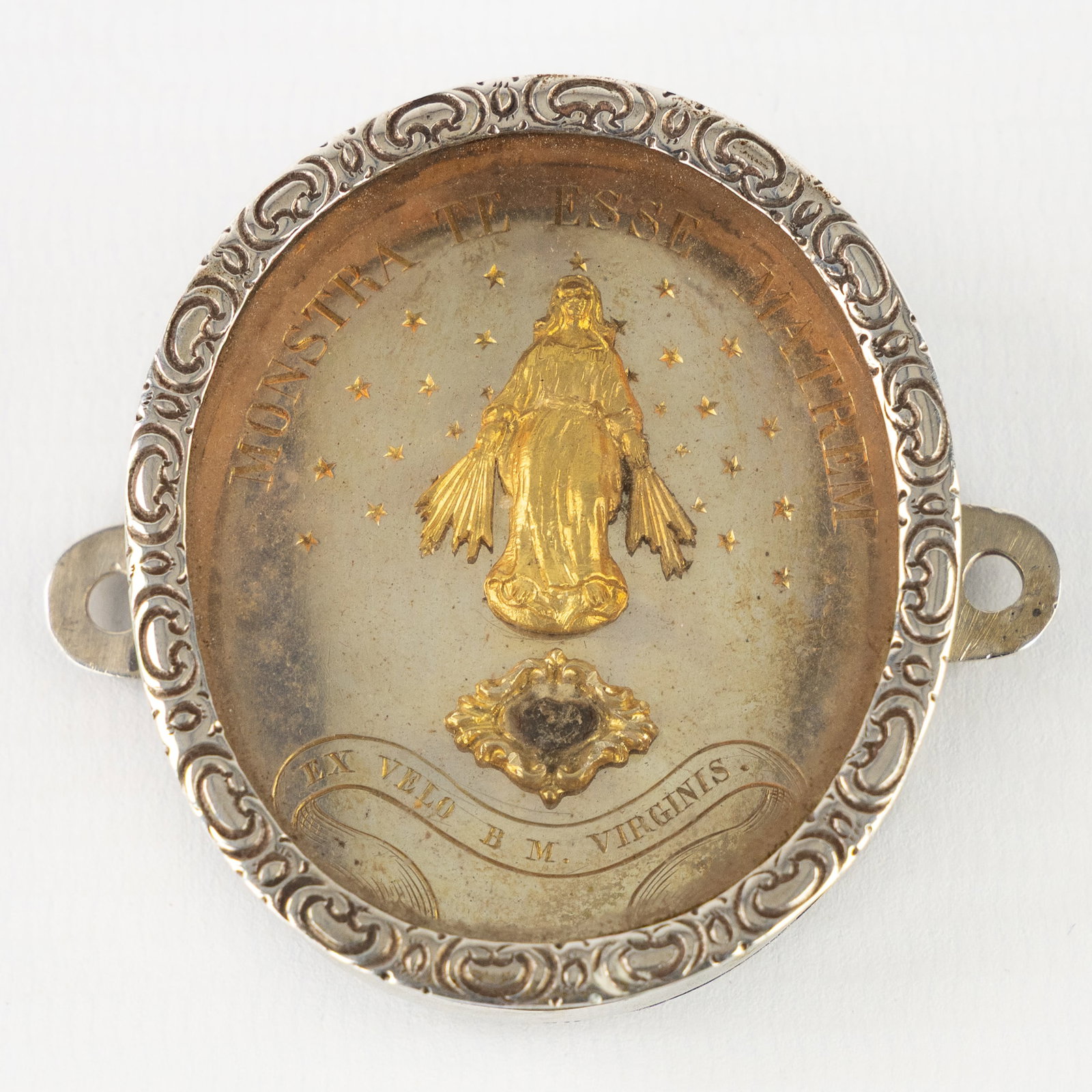 A Sealed silver theca with a Relic and Sculpture of the Blessed Virgin Mary. (1 of 2)