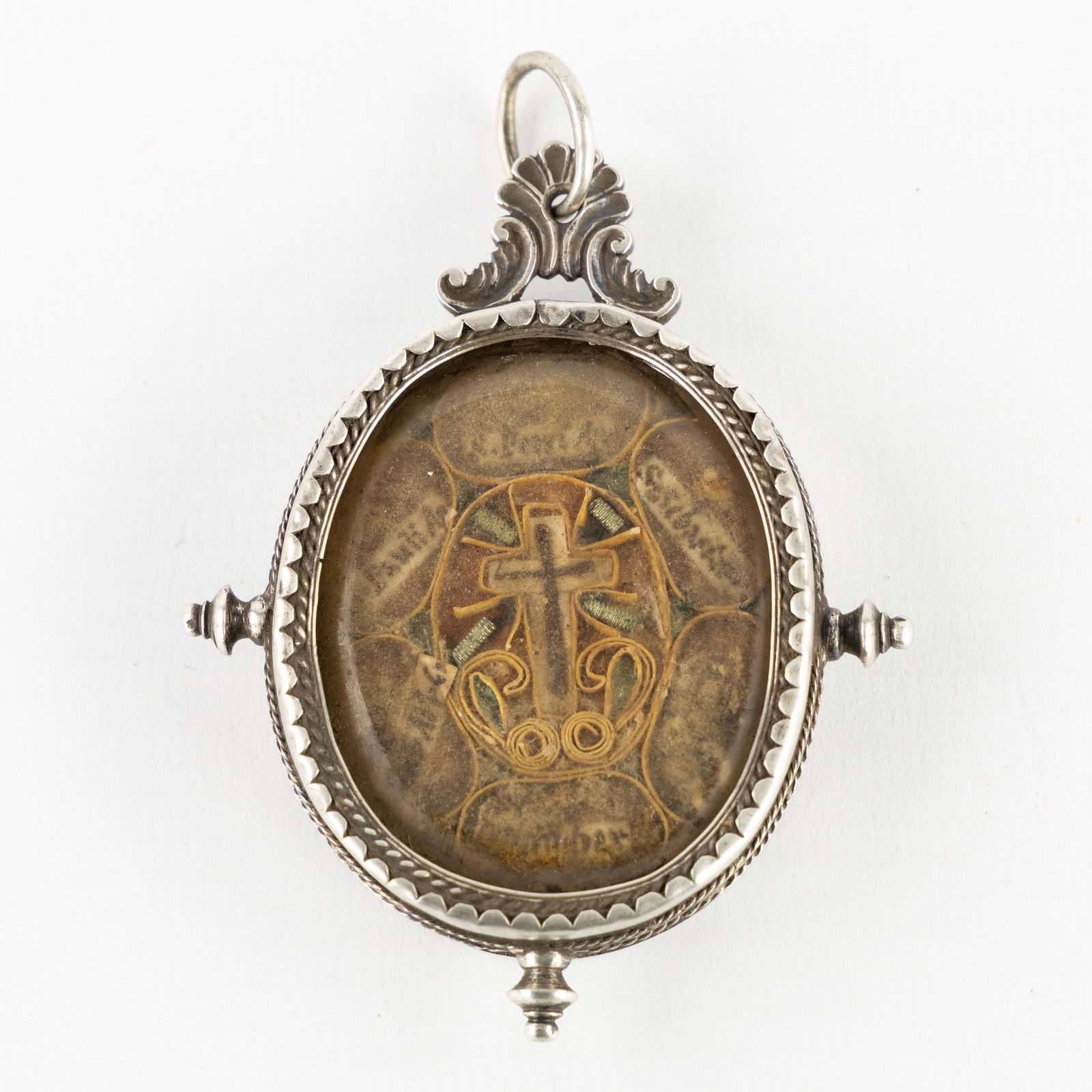 A Silver multi-theca with Relics of the True Cross, Apostles and Saints, 17th C. (1 of 2)