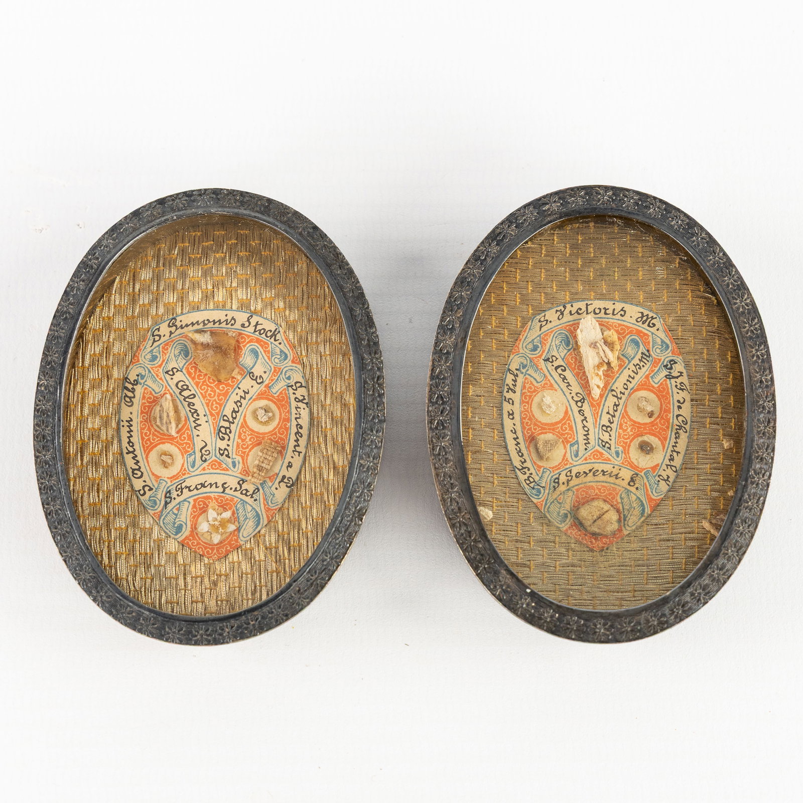 Two sealed multi-theca with relics for saint, bishops and martyrs. (1 of 2)