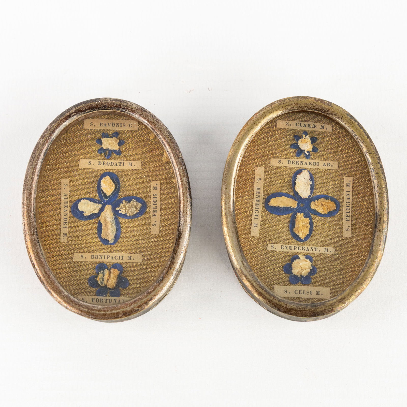 Two sealed multi theca with relics for saints and martyrs. (1 of 2)