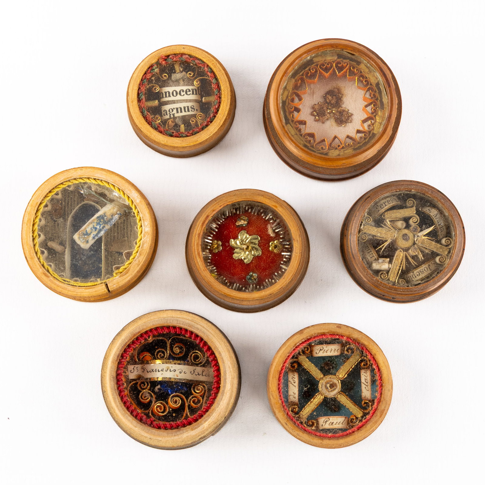 Seven wooden reliquaries or theca with relics of the Virgin Mary, the Apostles, and Saints. (1 of 2)