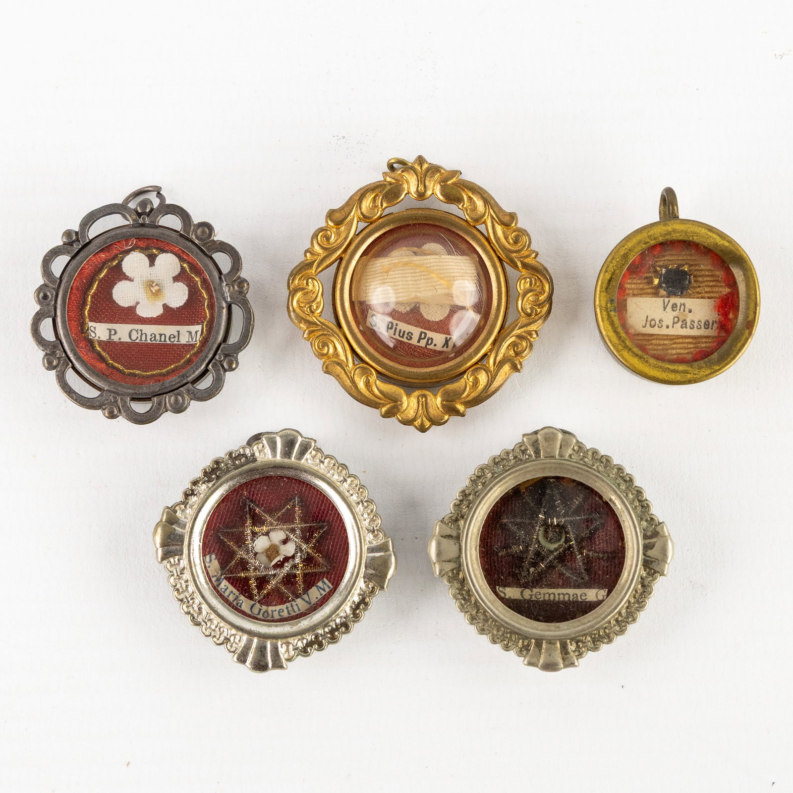 Five sealed theca or reliquaries with relics for Pope Pius X and Saints. (1 of 2)