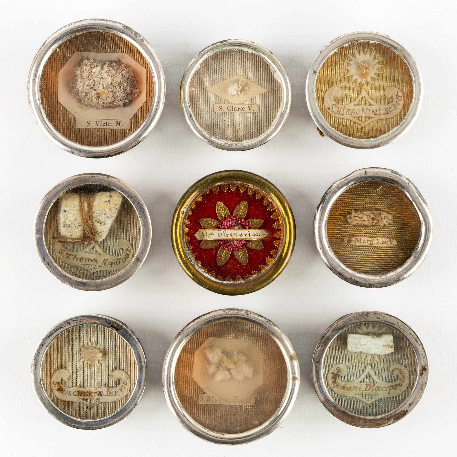 Nine sealed theca with relics for Saints and Martyrs, Thomas Aquino, Mararet of Leuven, Stephen and (1 of 2)
