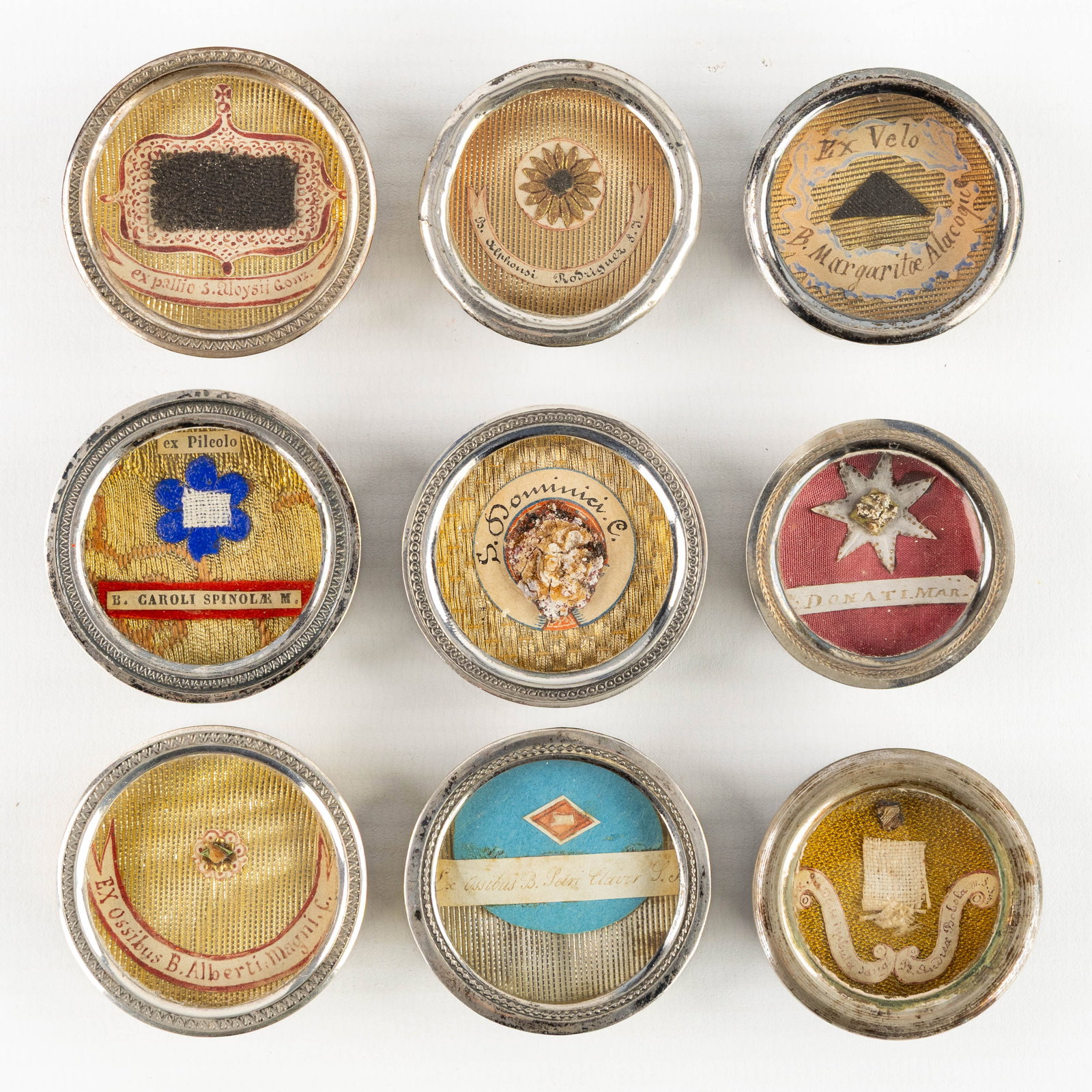 Nine sealed theca with relics for Saints and Martyrs, mostly of the Jesuit Order and others. (1 of 2)