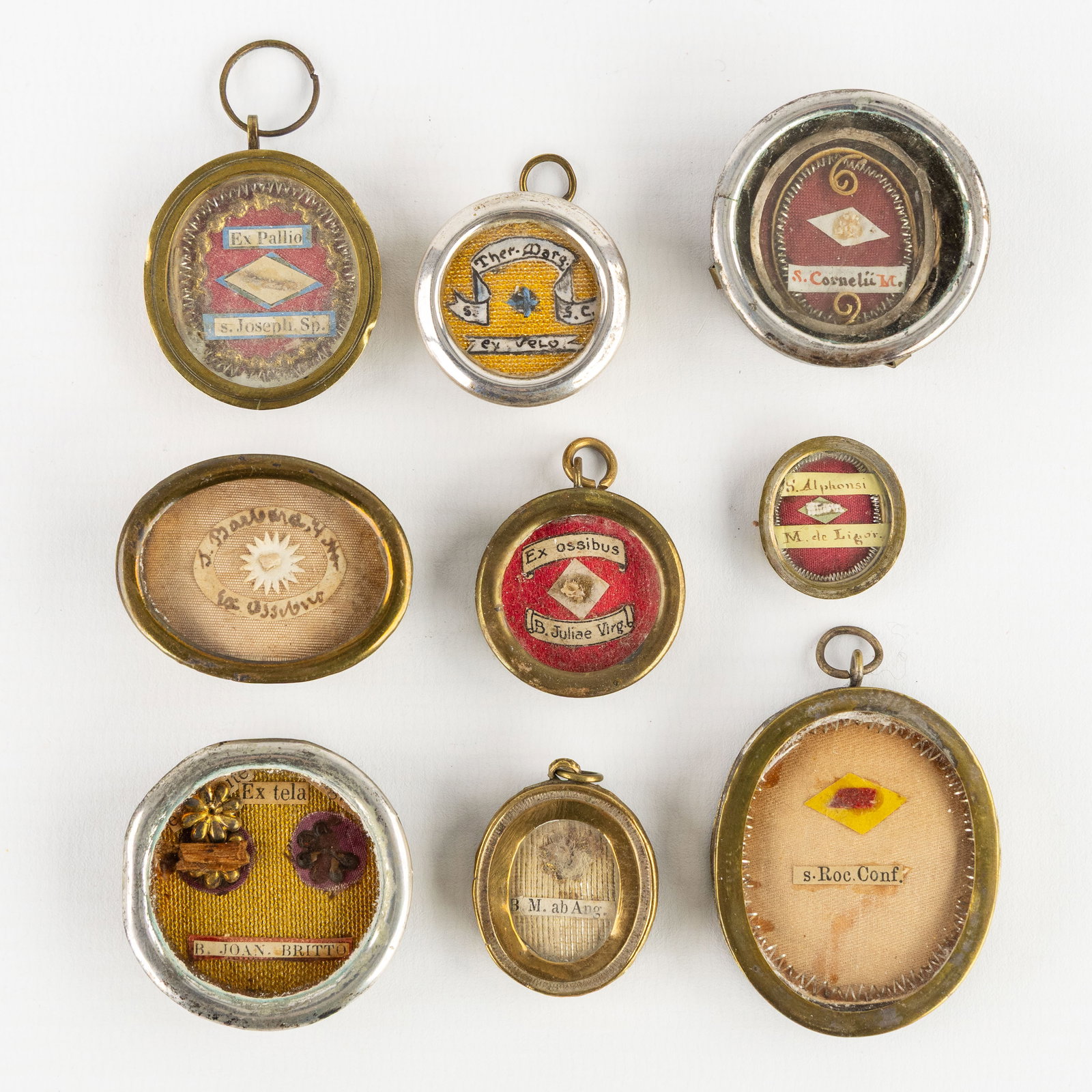 Nine sealed theca with relics for Saints and Martyrs, Rochus, John Britto and Teresia Margareta (1 of 2)