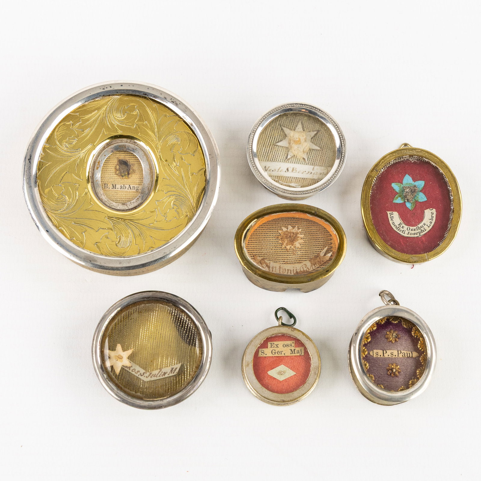 Seven Theca, five of which are sealed, with Relics for Saints and Blessed. (1 of 2)