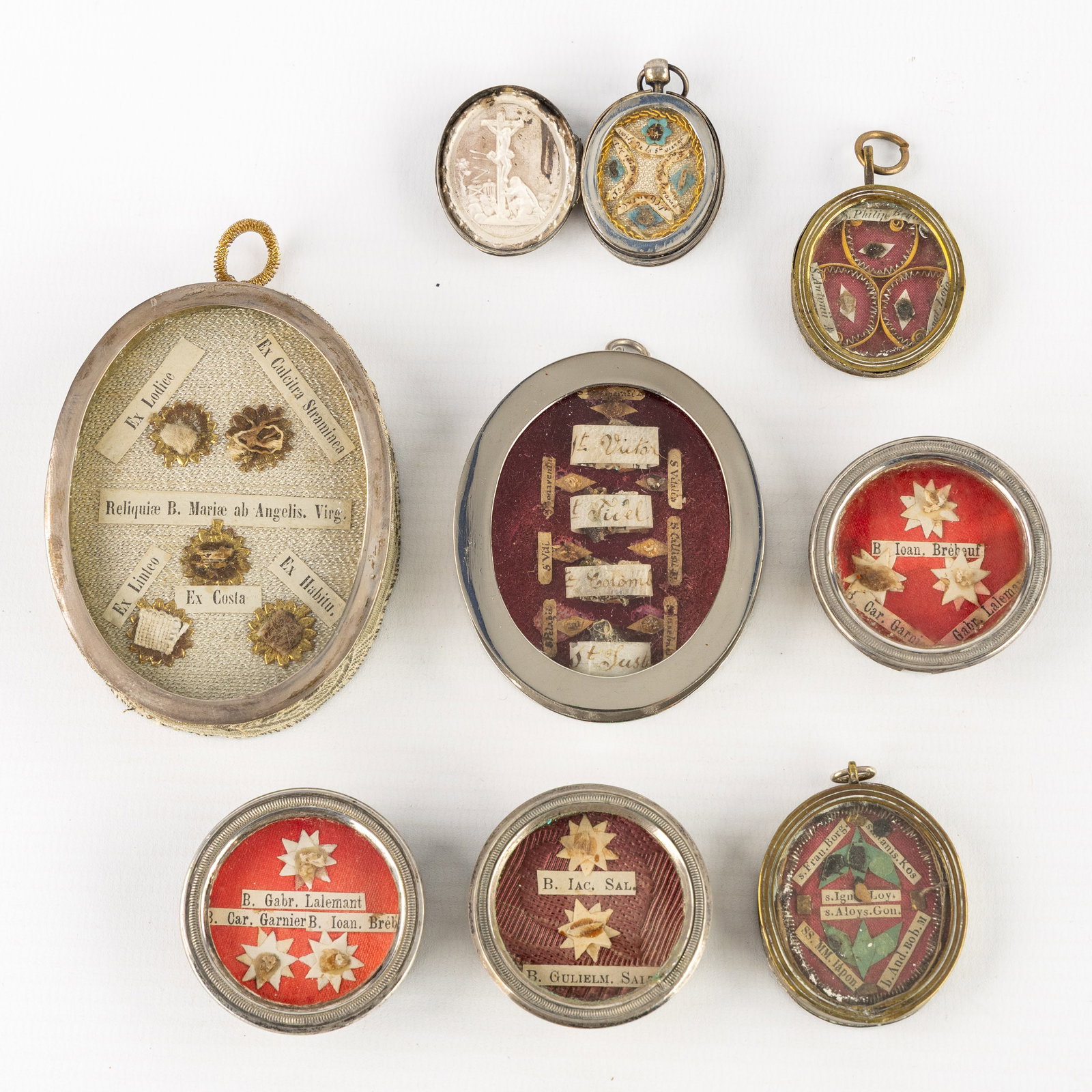 Eight Sealed theca and multi-theca with relics for Saints. (1 of 2)