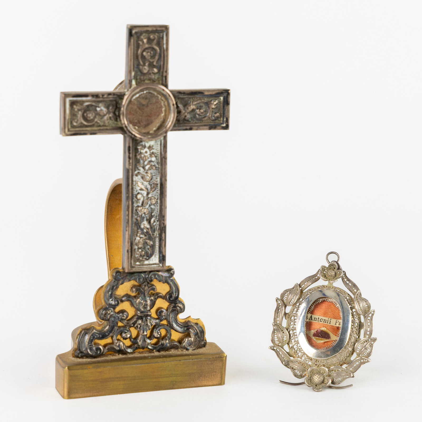 A sealed reliquary cross and sealed pendant, filigree silver, with relics of Saints Ignatius of (1 of 9)