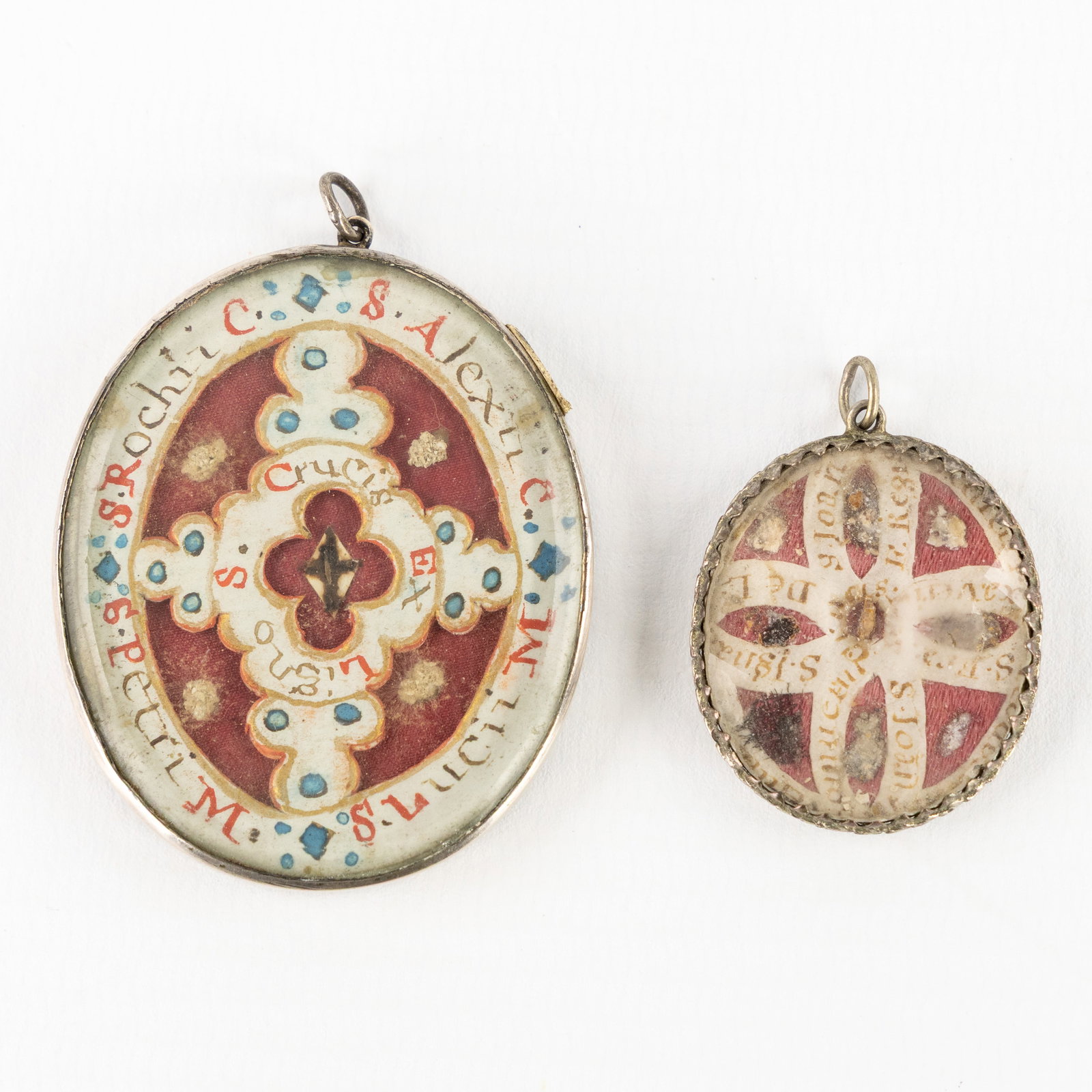 Two pendants containing relics and miniature portraits of Saint Nicholas of Myra and Saint John of (1 of 2)