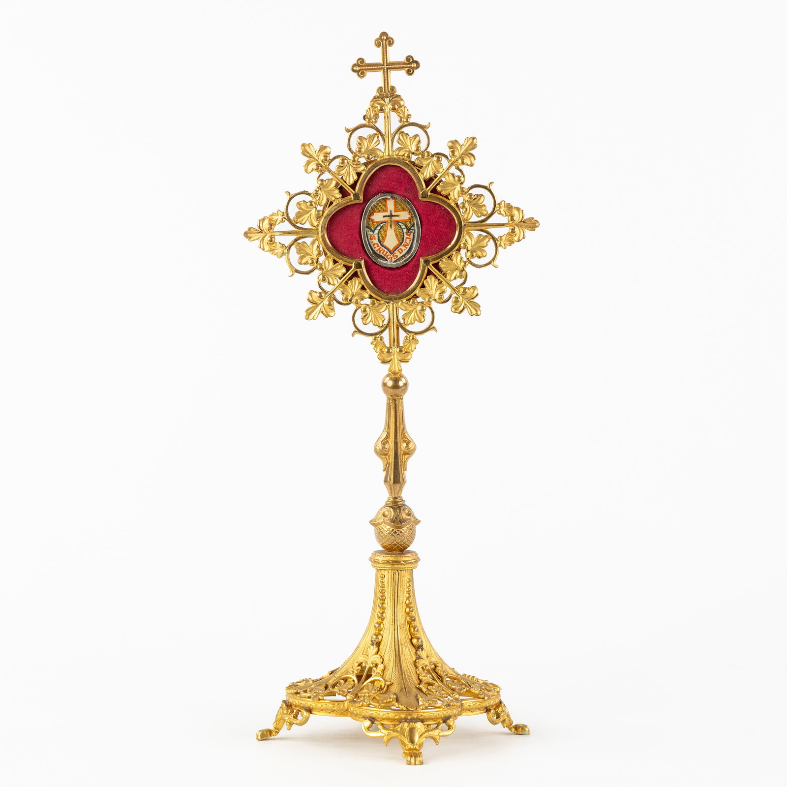 A Brass reliquary monstrance with a Sealed Relic of the True Cross. Gothic Revival.: A Brass reliquary monstrance with a Sealed Relic of the True Cross. Gothic Revival. Sealed relic of the True Cross of Our Lord Jesus Christ (S. Crucis D.N.J.S.). Decorated with vines and mounted with
