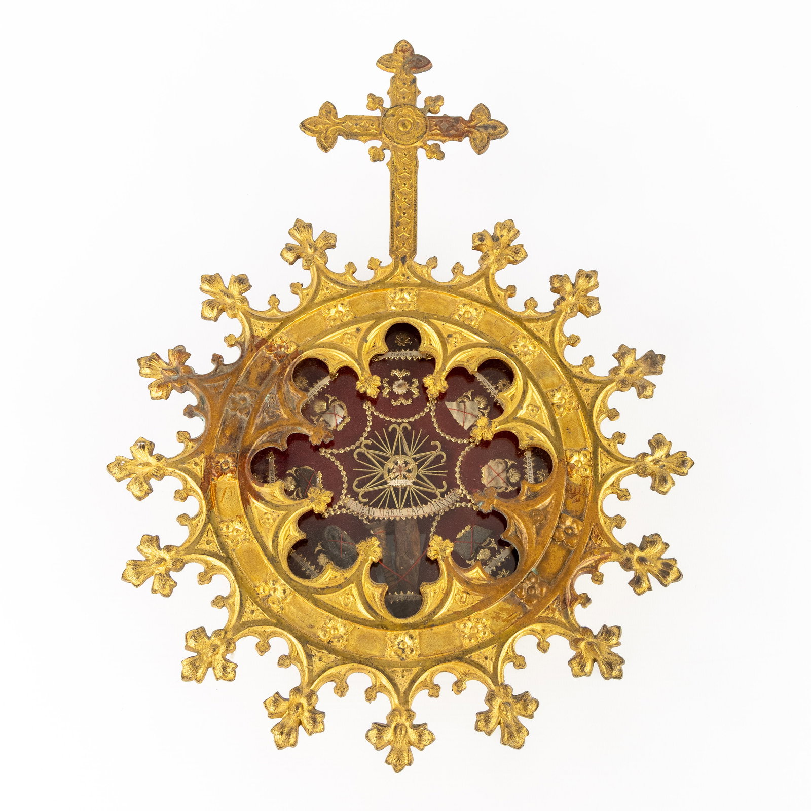 A Large reliquary with a Sealed multi-theca with relics for John Vianney, Pastor of Ars.: A Large reliquary with a Sealed multi-theca with relics for John Vianney, Pastor of Ars. A Gothic Revival reliquary, gilded brass, mounted with a crucifix and Gothic ornamentation. With a large sealed