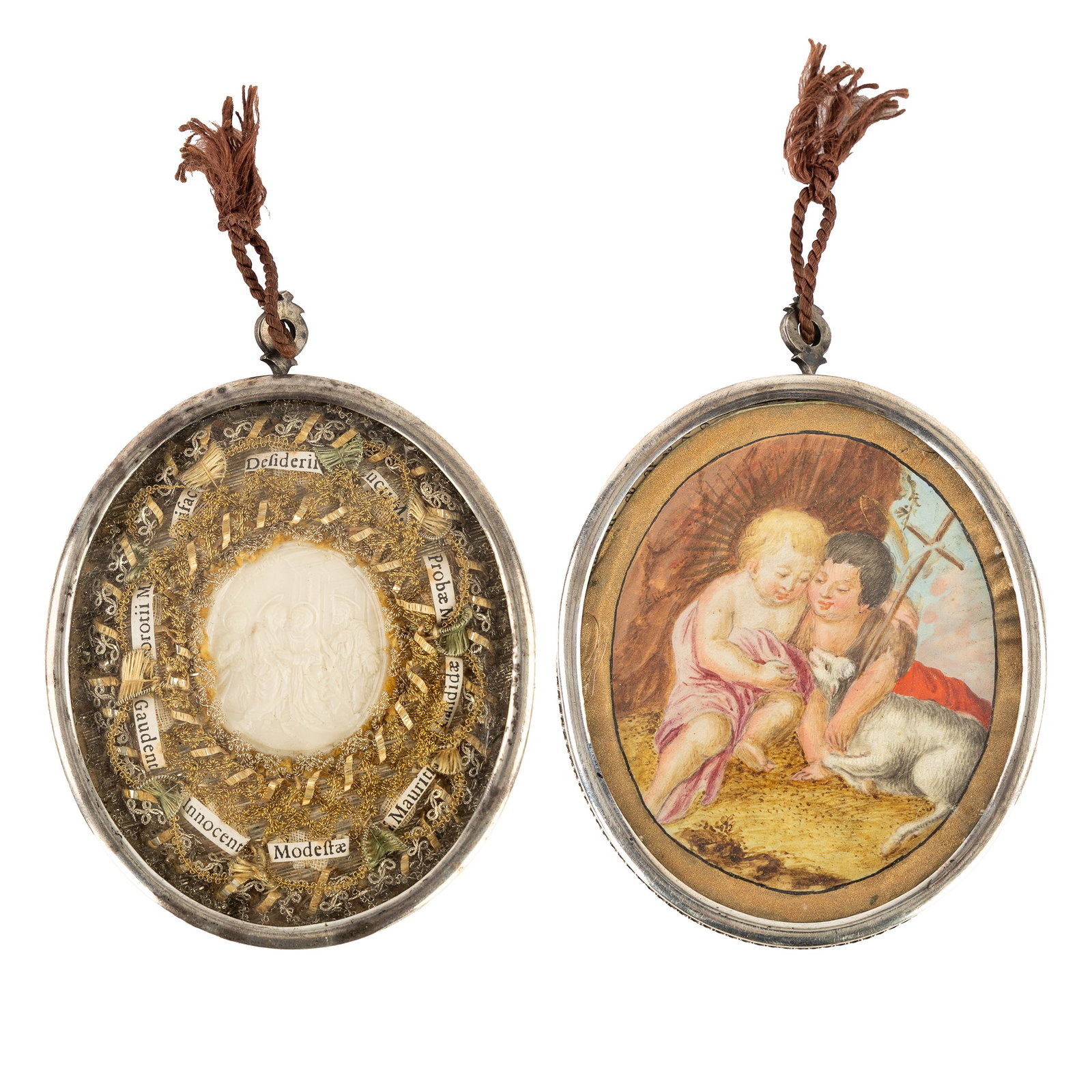 A Large silver reliquary pendant with 10 Relics for Saints and a miniature painting of the Child (1 of 3)