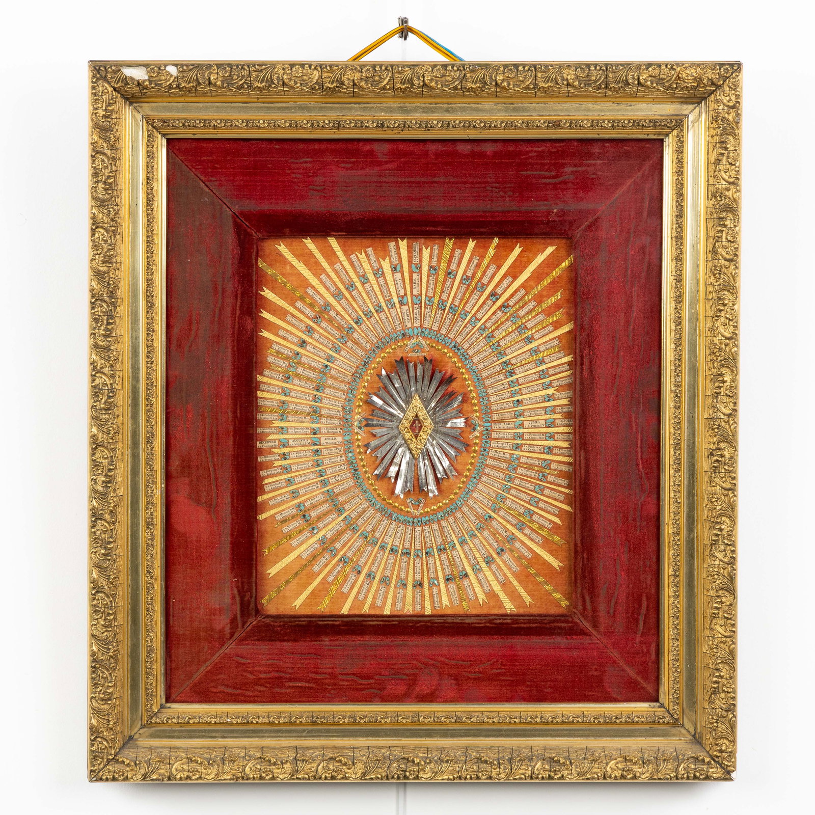 An annual calendar featuring 365 relics, the Passion cycle, the True Cross and John the Baptist.: An annual calendar featuring 365 relics, the Passion cycle, the True Cross and John the Baptist. An annual calendar featuring 365 relics of saints, one for each month. Neatly framed and mou