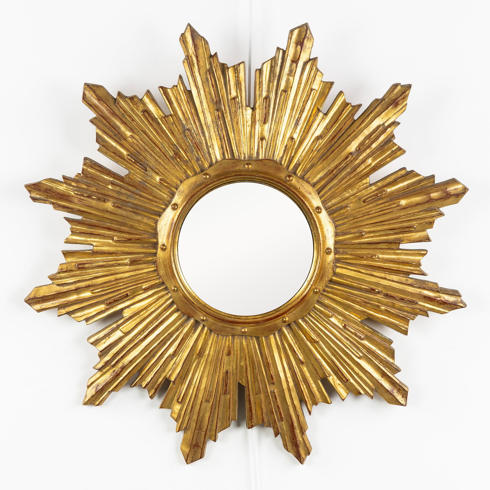 A Mid-Century Sunburst Mirror, Gilded, Convex Glass. Circa 1970. (1 of 3)