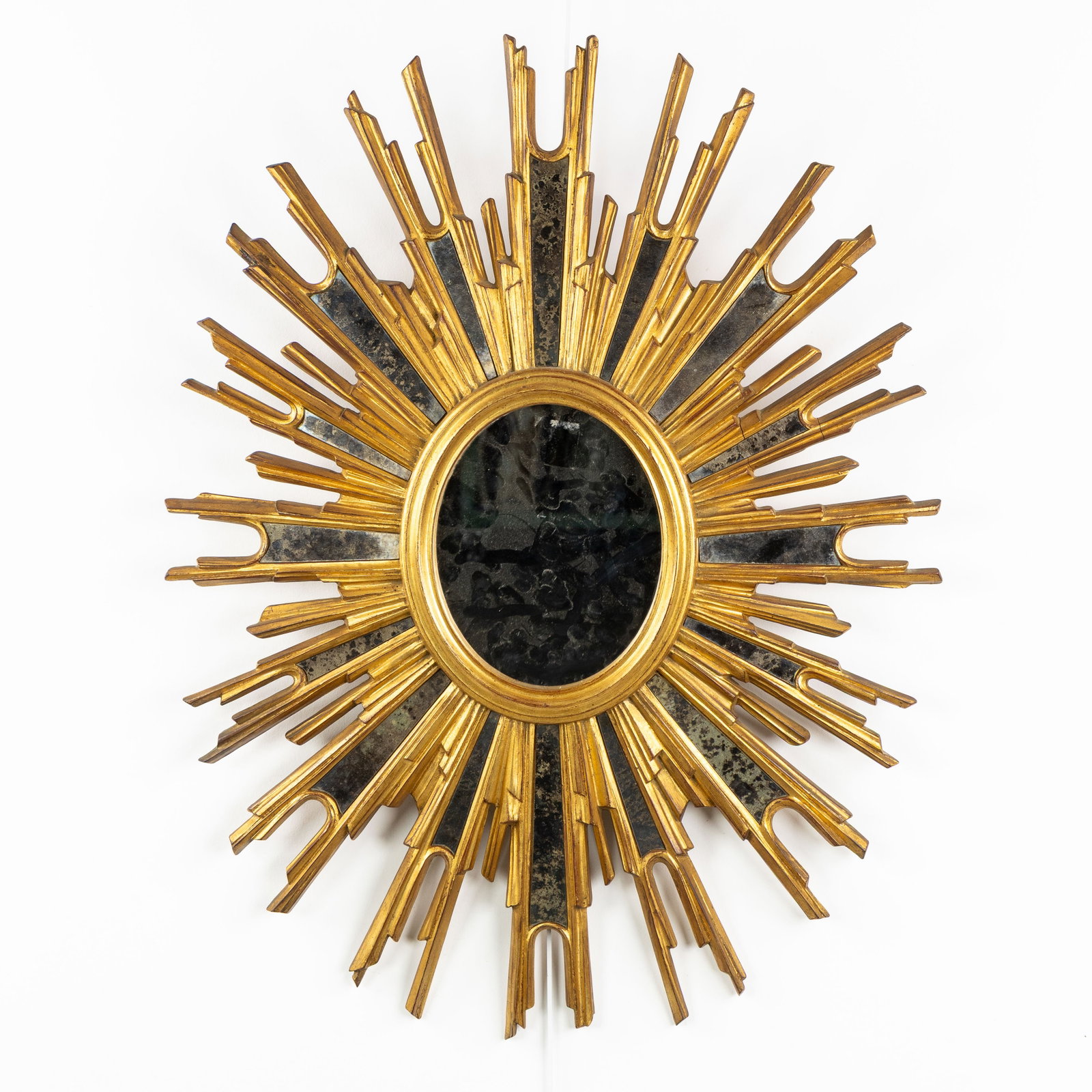 Deknudt, a Large Oval Mid-Century Sunburst mirror, Gilded, Plane mirror. Circa 1970. (1 of 6)
