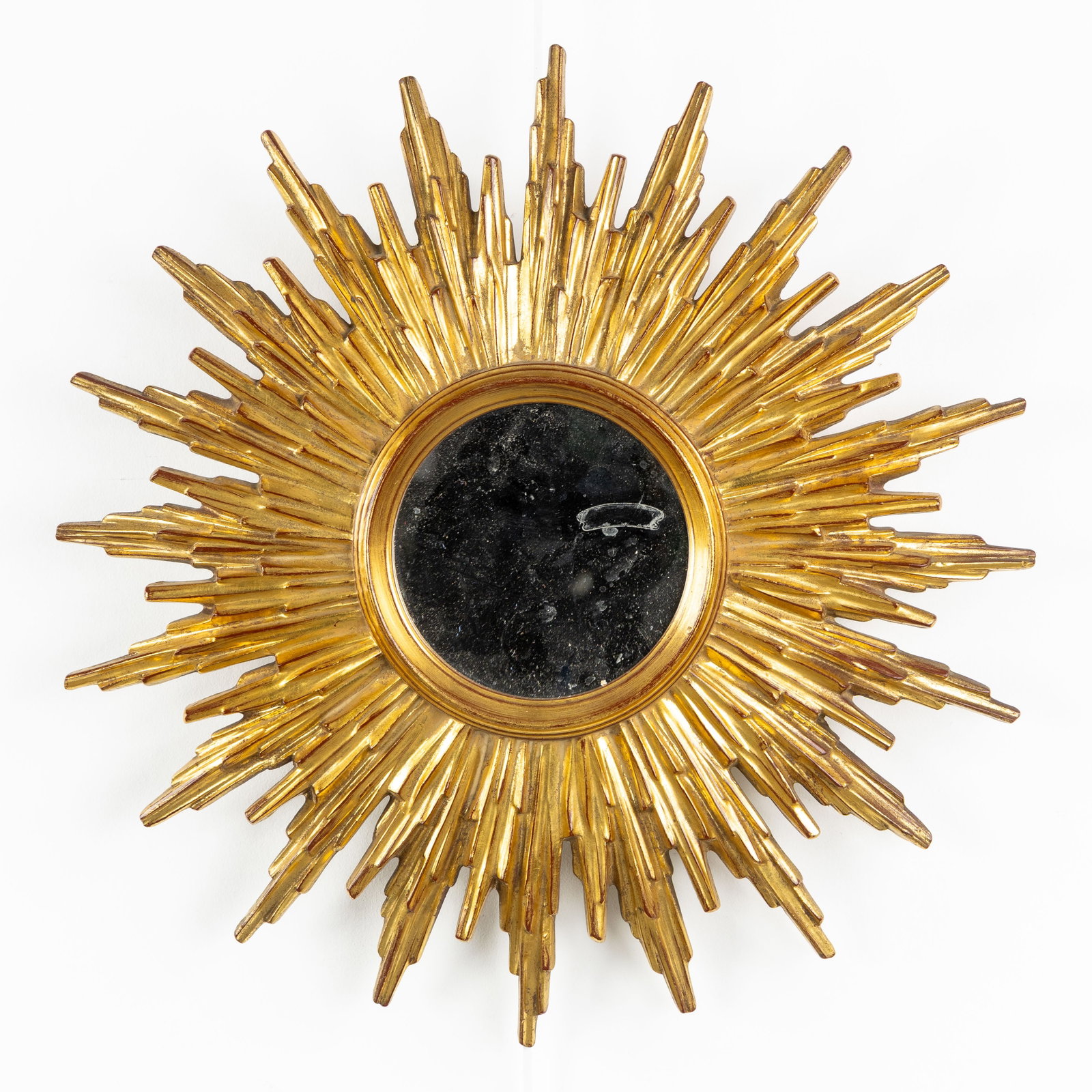 Deknudt, a Mid-Century Sunburst Mirror, Gilded, Plane mirror. Circa 1970. (1 of 3)