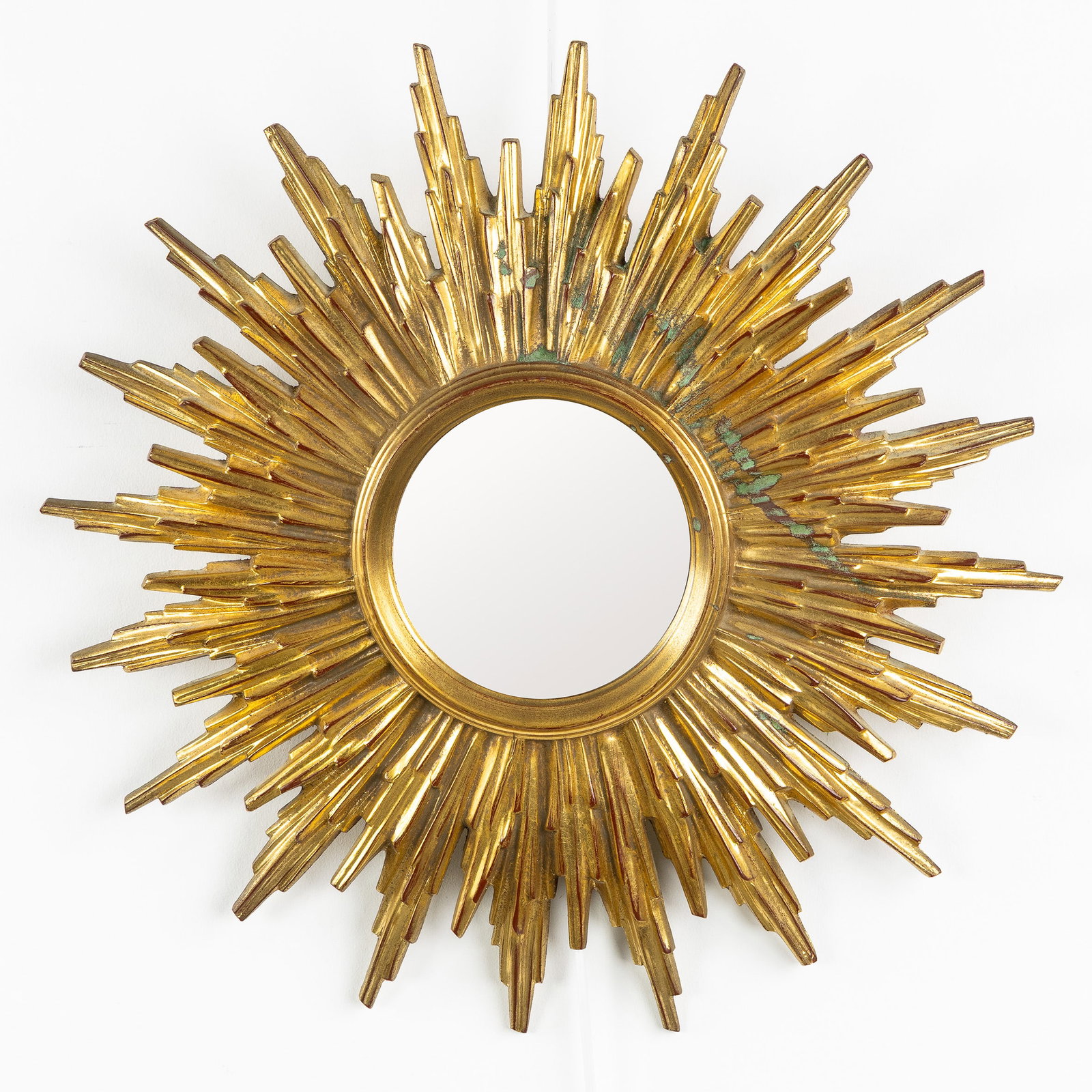 Deknudt, a Mid-Century sunburst mirror, gilded, plane mirror. Circa 1970. (1 of 4)