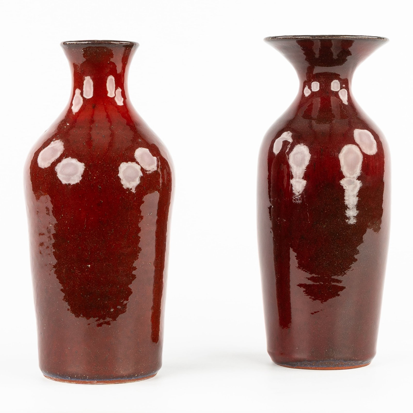 Leon Goossens (XX) two vases, red glazed ceramics. (1 of 5)