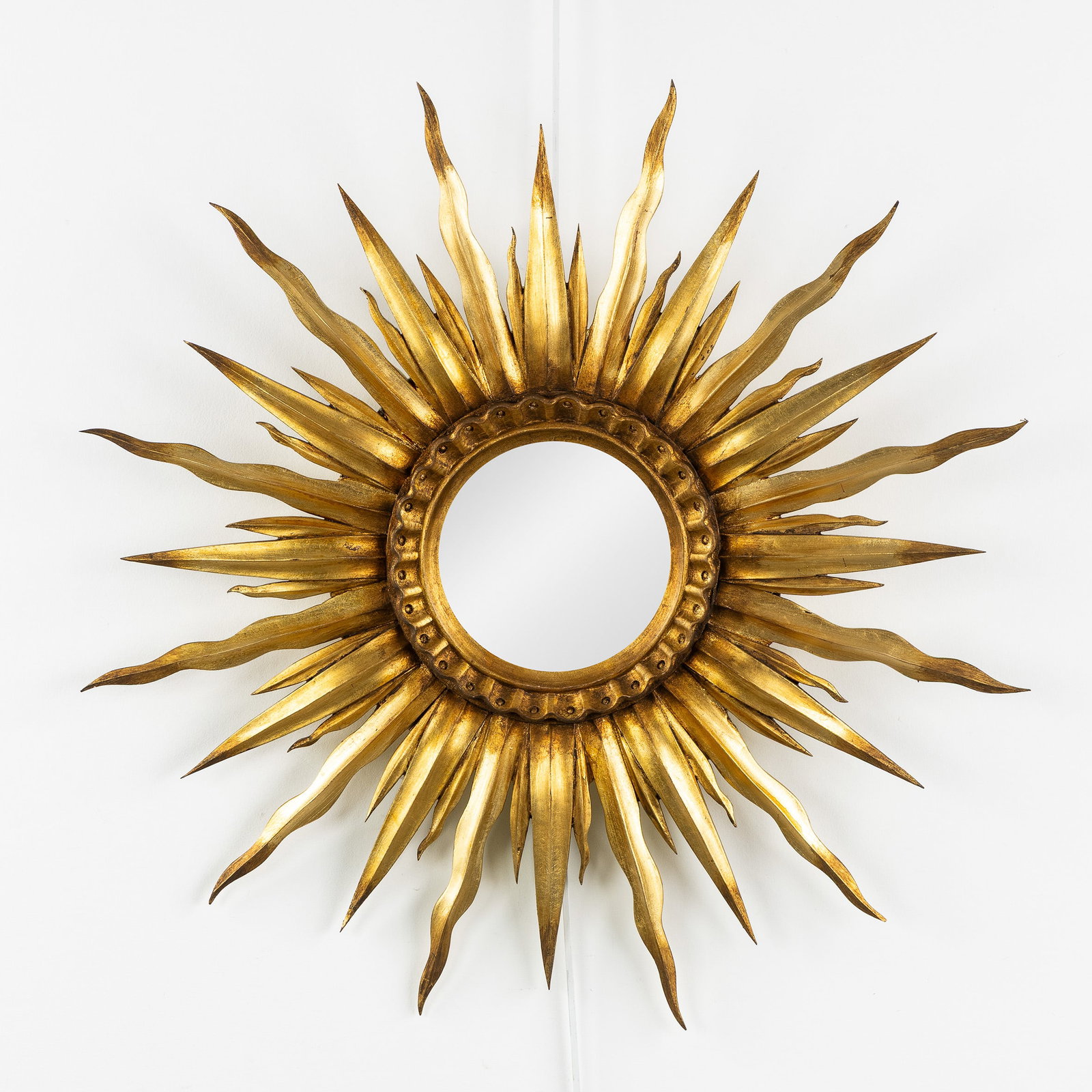 A Mid-Century Sunburst Mirror, Gilt wood, Convex Glass. (1 of 3)