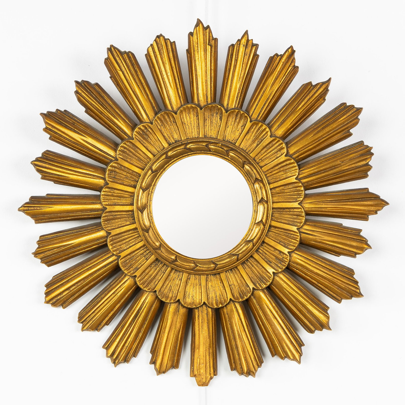 A Mid-Century Sunburst Mirror, Gilt, Convex Glass. Circa 1970. (1 of 3)