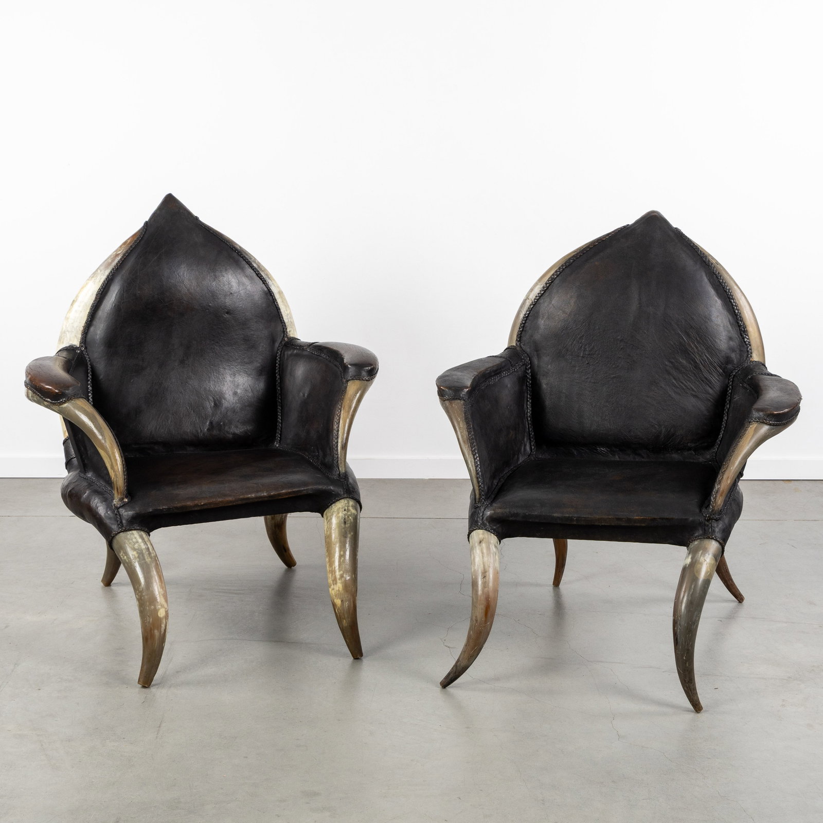 A Pair of 'Ranch' armchairs, buffalo horns and leather. (1 of 8)