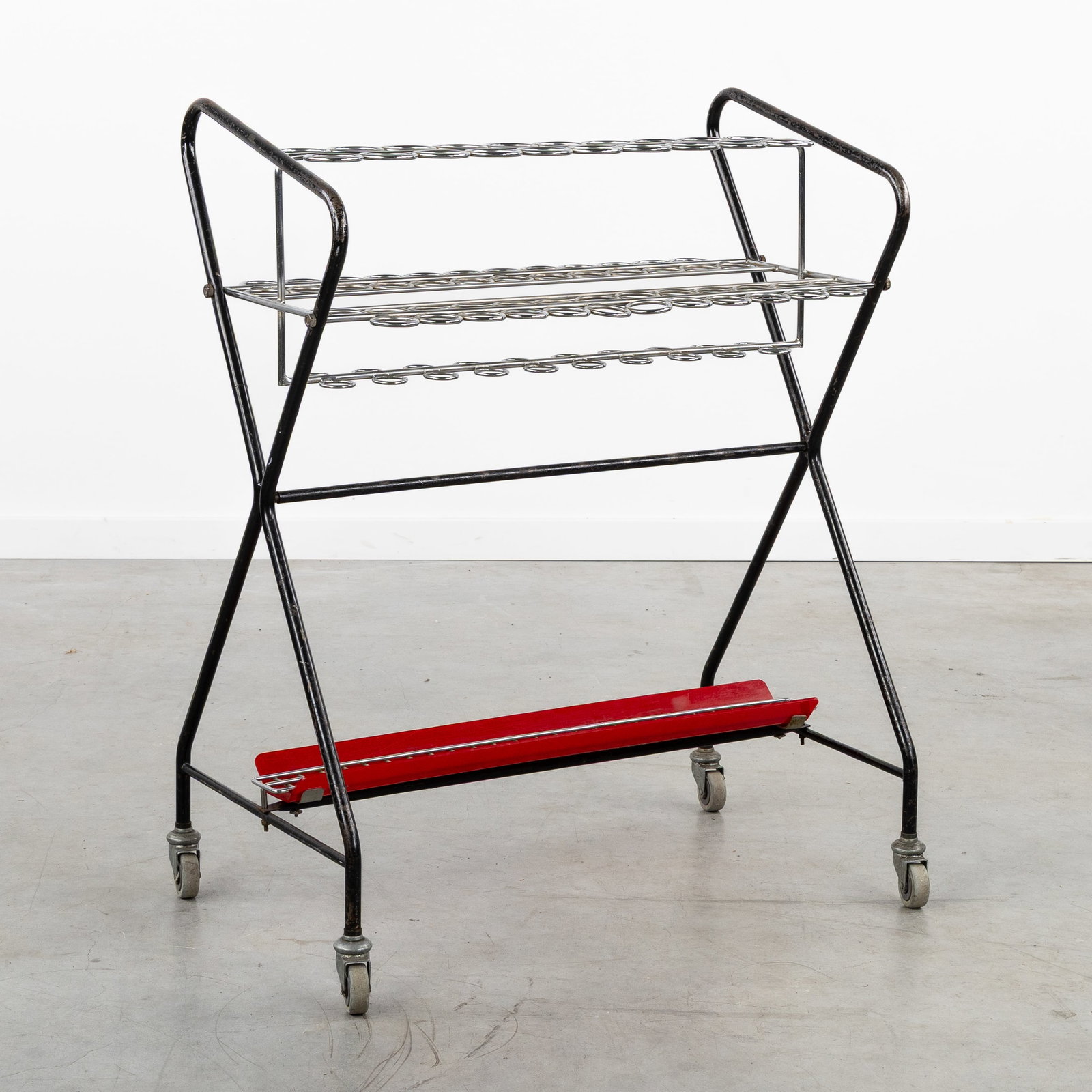 A Mid-Century walking cane stand or trolley, patinated and chrome-plated metal. (1 of 8)