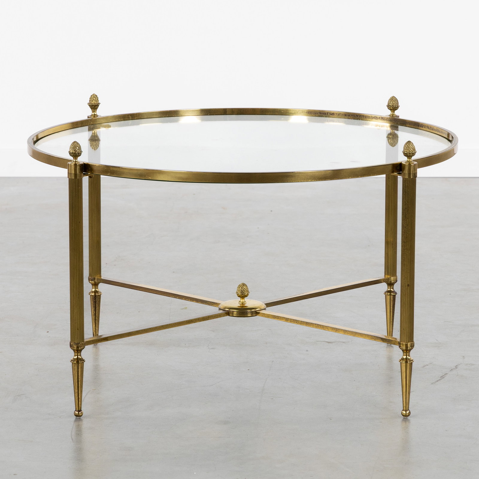 A Hollywood Regency coffee table, gilded brass and glass, in the style of Maison Bagues, circa 1960. (1 of 6)