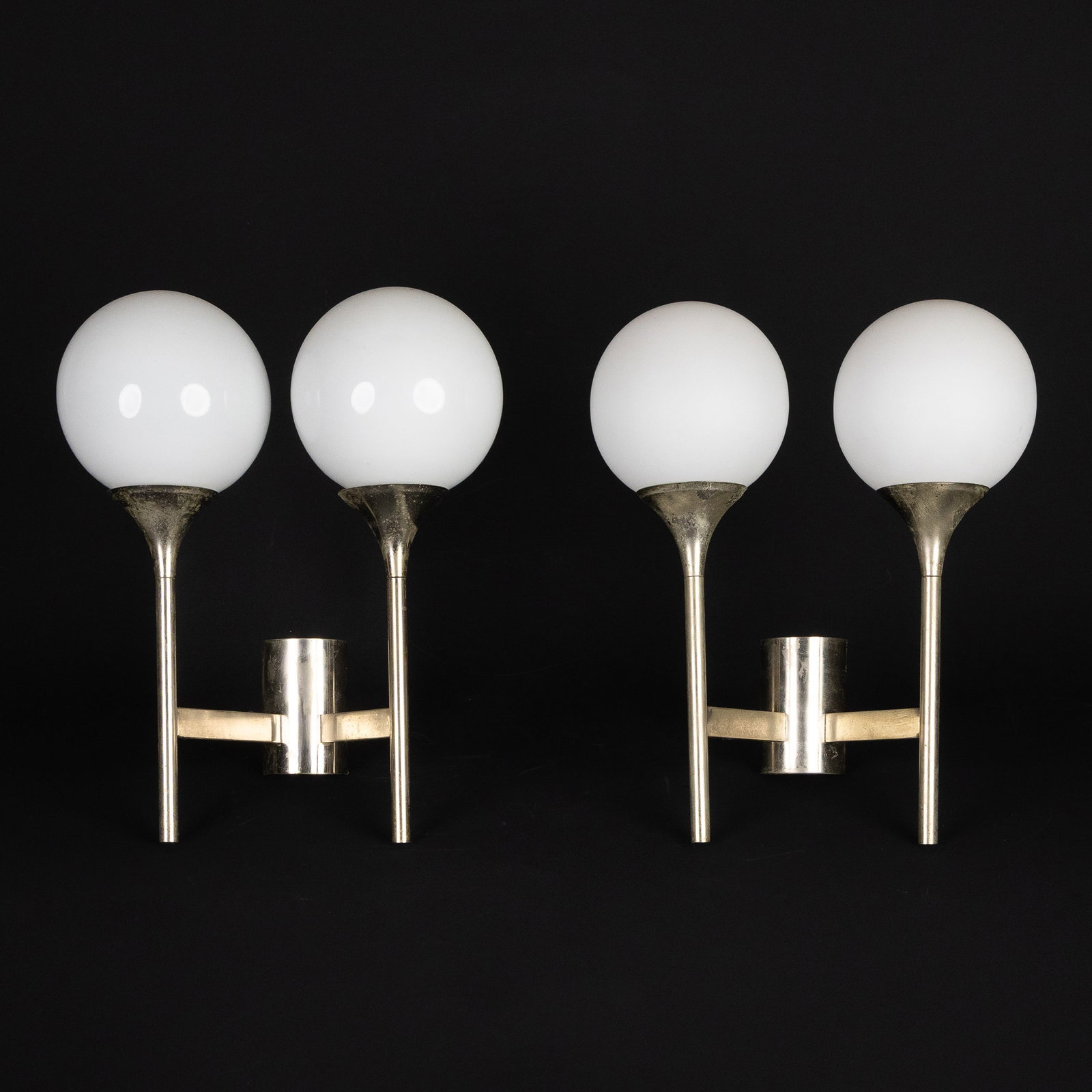 Gaetano Sciolari (1927–1994) (attrib.) ‘A Pair of Wall Lamps', opaline glass and chrome-plated: Gaetano Sciolari (1927–1994) (attrib.) 'A Pair of Wall Lamps', opaline glass and chrome-plated metal. Opaline glass globes, mounted on chrome-plated metal wall brackets. In the style of Gaetano Scio