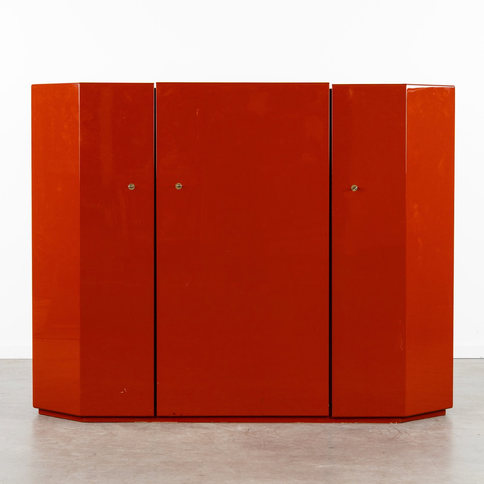 Kazuhide Takahama (1930-2010) 'Bramante', a red lacquered cabinet, for Simon Gavina, Italy, circa: Kazuhide Takahama (1930-2010) 'Bramante', a red lacquered cabinet, for Simon Gavina, Italy, circa 1980. Red lacquered wood.Three-door cabinet.Model Bramante.Design by Kazuhide Takahama, in 1974, for S