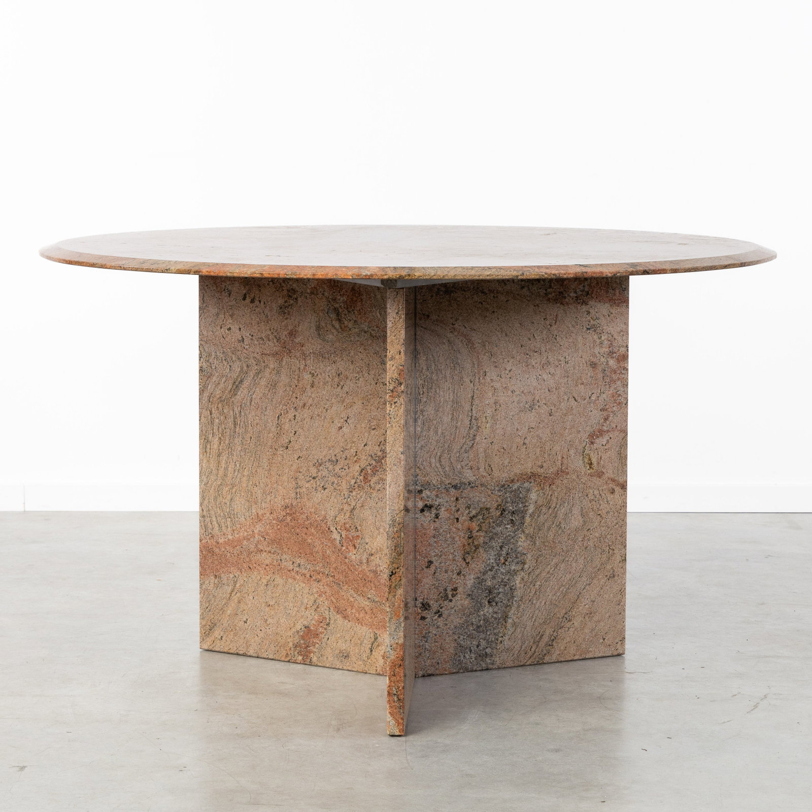 A Round dining table in Juparana granite, circa 1980. (1 of 6)
