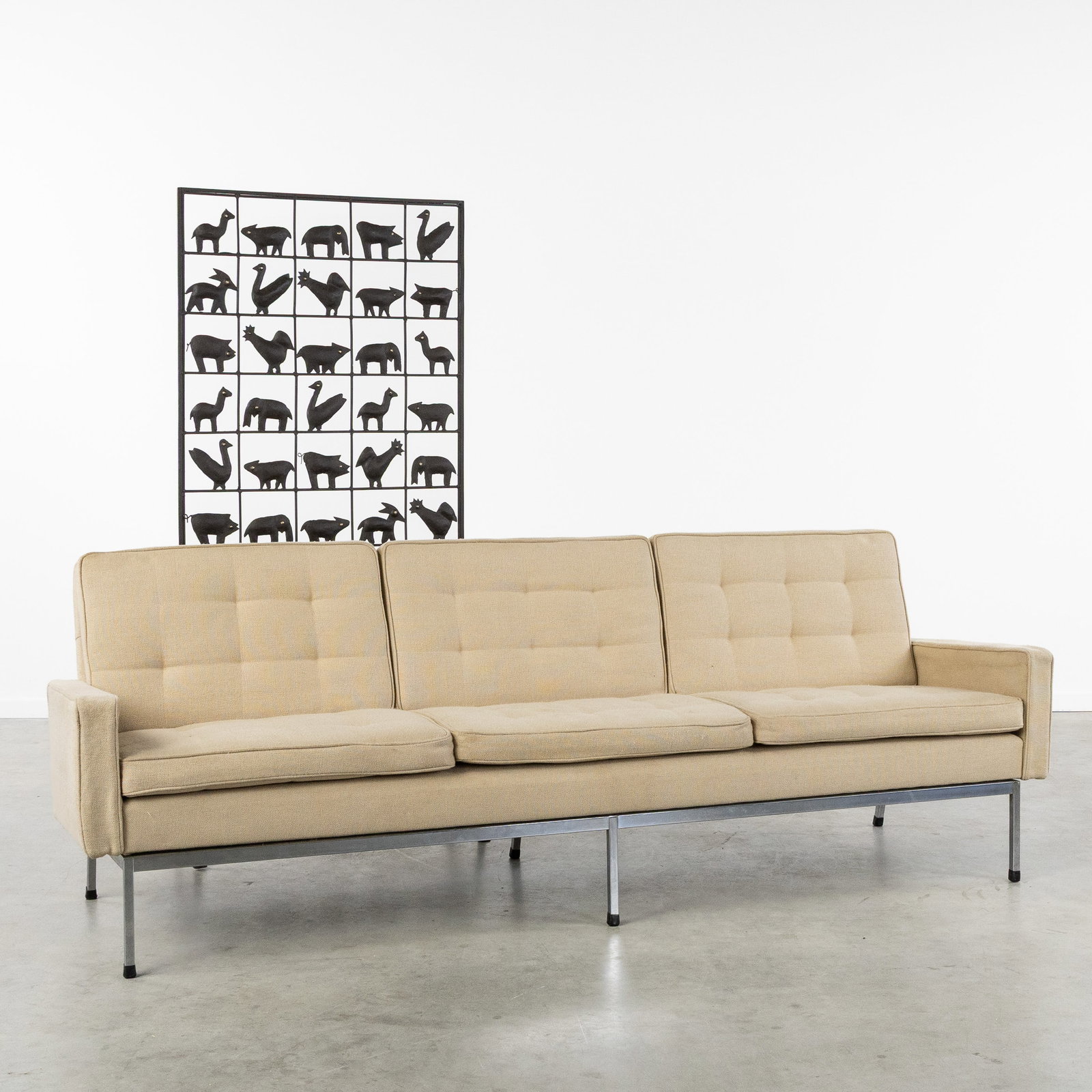 Florence Knoll (1917-2019) 'Model 67A', a three-seater sofa, chrome-plated metal and upholstery, for (1 of 8)