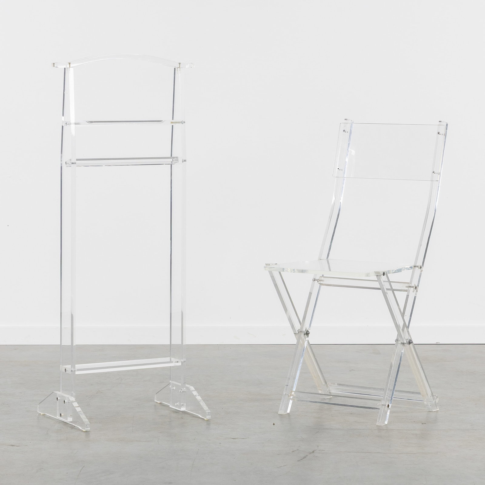 A Mid-Century folding chair and clothes rack, transparent acrylic or Lucite, second half of the 20th (1 of 8)