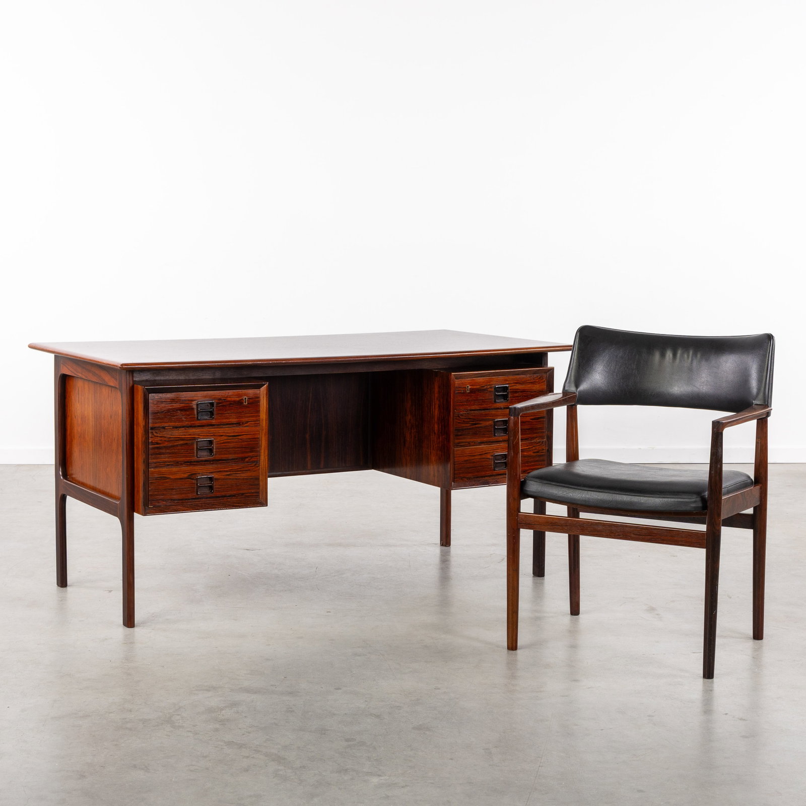 Arne Vodder (1926-2009) a Rosewood desk, for Sibast, with matching desk chair, Denmark, circa 1960. (1 of 14)