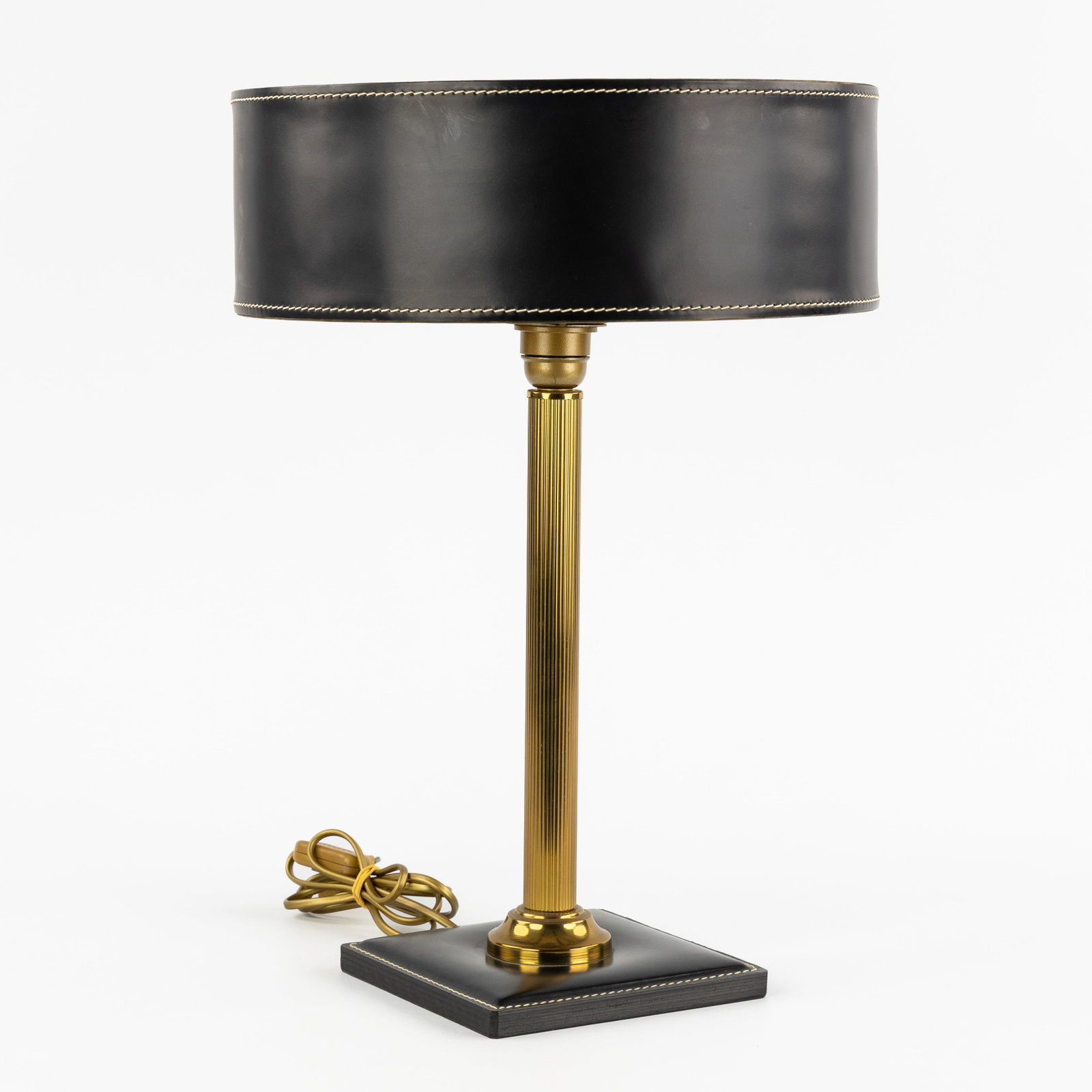 Jacques Adnet (1900-1984) a table lamp, for ILG, black leather and gilded metal, circa 1990. (1 of 8)