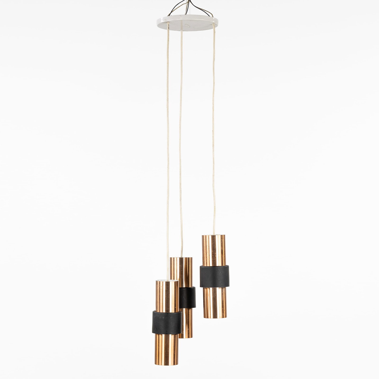 A ceiling lamp with three pendants, ‘Rond toe rond aan' for Raak Amsterdam. Netherlands, circa: A ceiling lamp with three pendants, 'Rond toe rond aan' for Raak Amsterdam. Netherlands, circa 1960. Model titled 'Rond toe rond aan' with model number B-1198. A ceiling lamp with 3 pendants. Bra