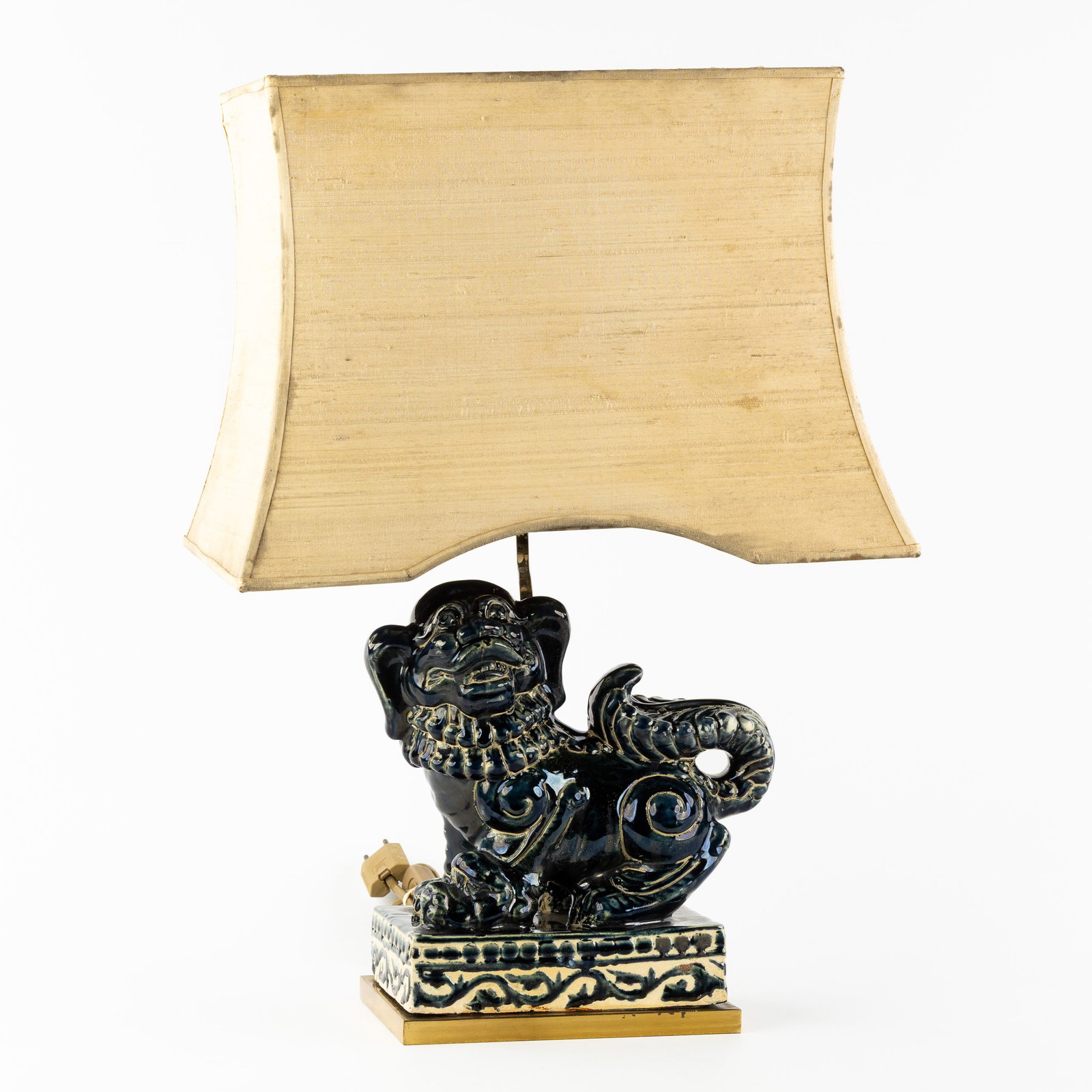 A Mid-Century 'Foo Dog' table lamp, glazed ceramic and brass, in the style of Deknudt, circa 1970. (1 of 8)