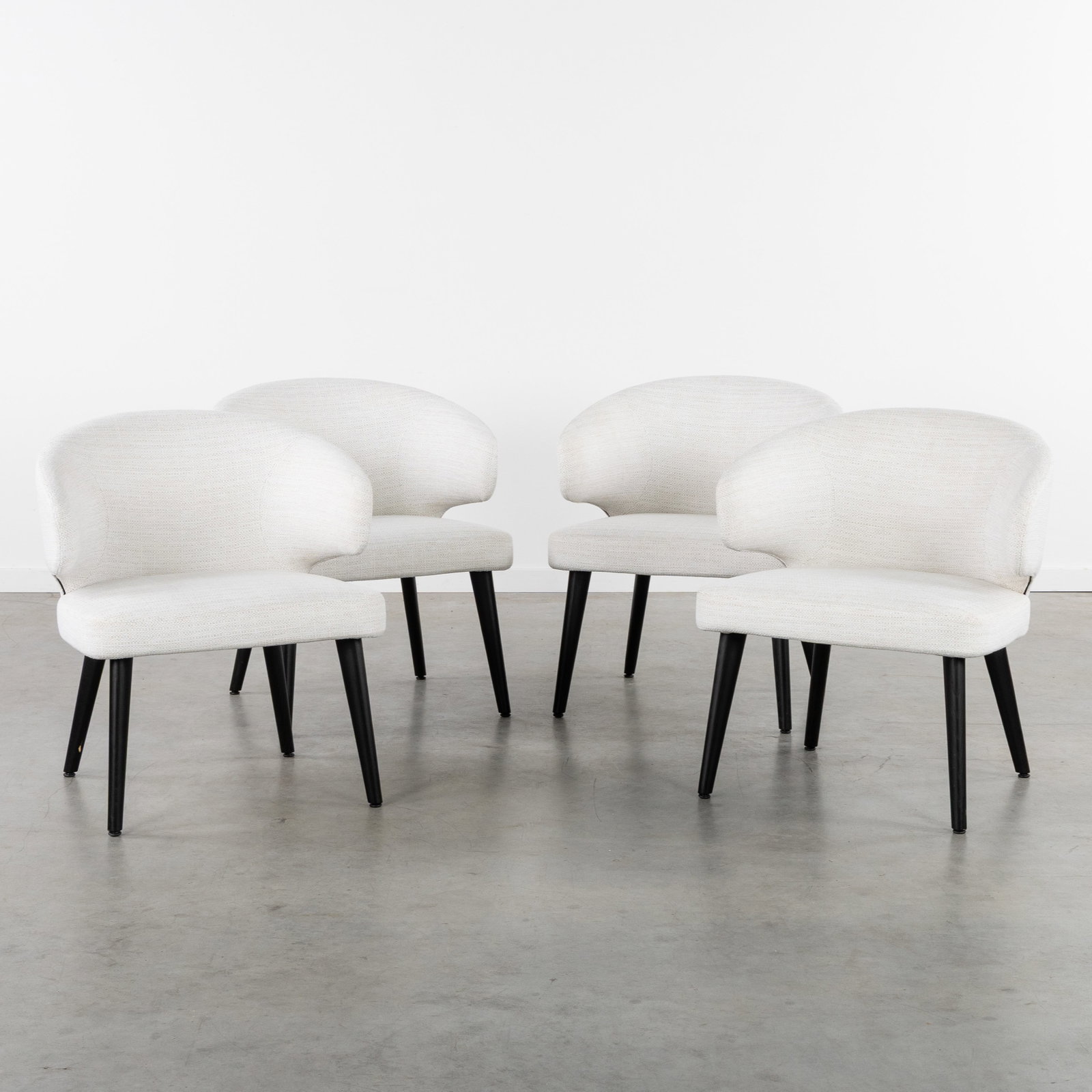 Rodolfo Dordoni (1954-2023) 'Aston Dining', four armchairs, patinated wood and upholstery, Italy, (1 of 3)